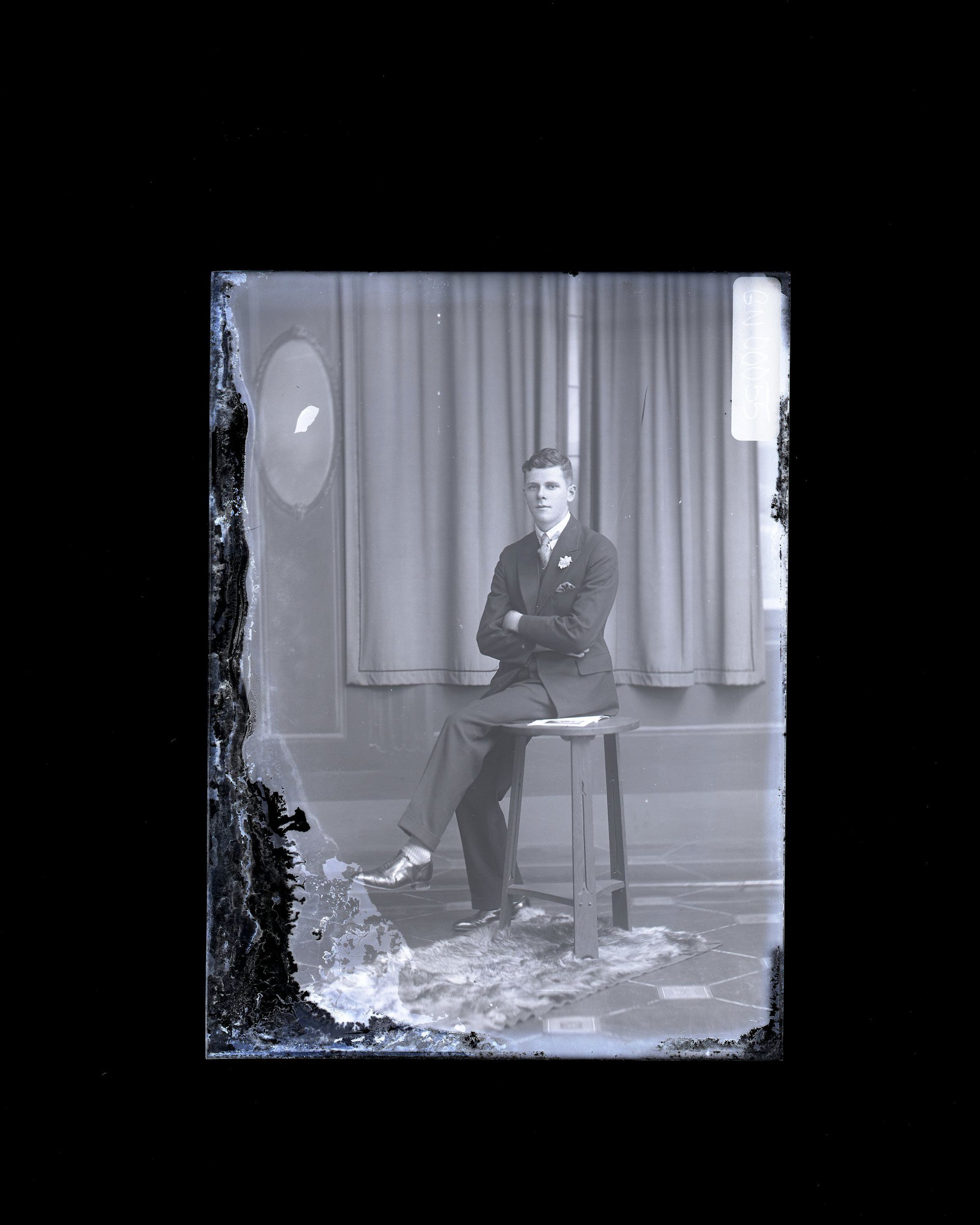 Seated Man - Illegible Name