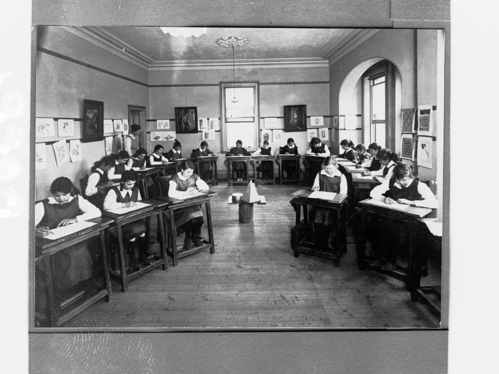 Schoolgirls working at their desks,  unknown South Australian school