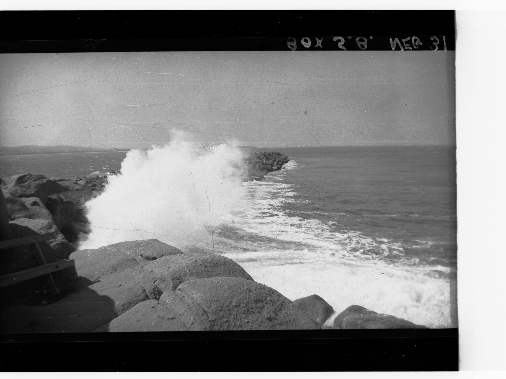 Coastal View showing sea spray splashing against rocks