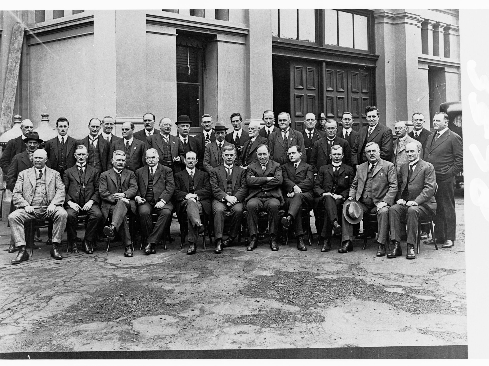 Group portrait of several men (includes H Barwell, G Laffer and G Ritchie)