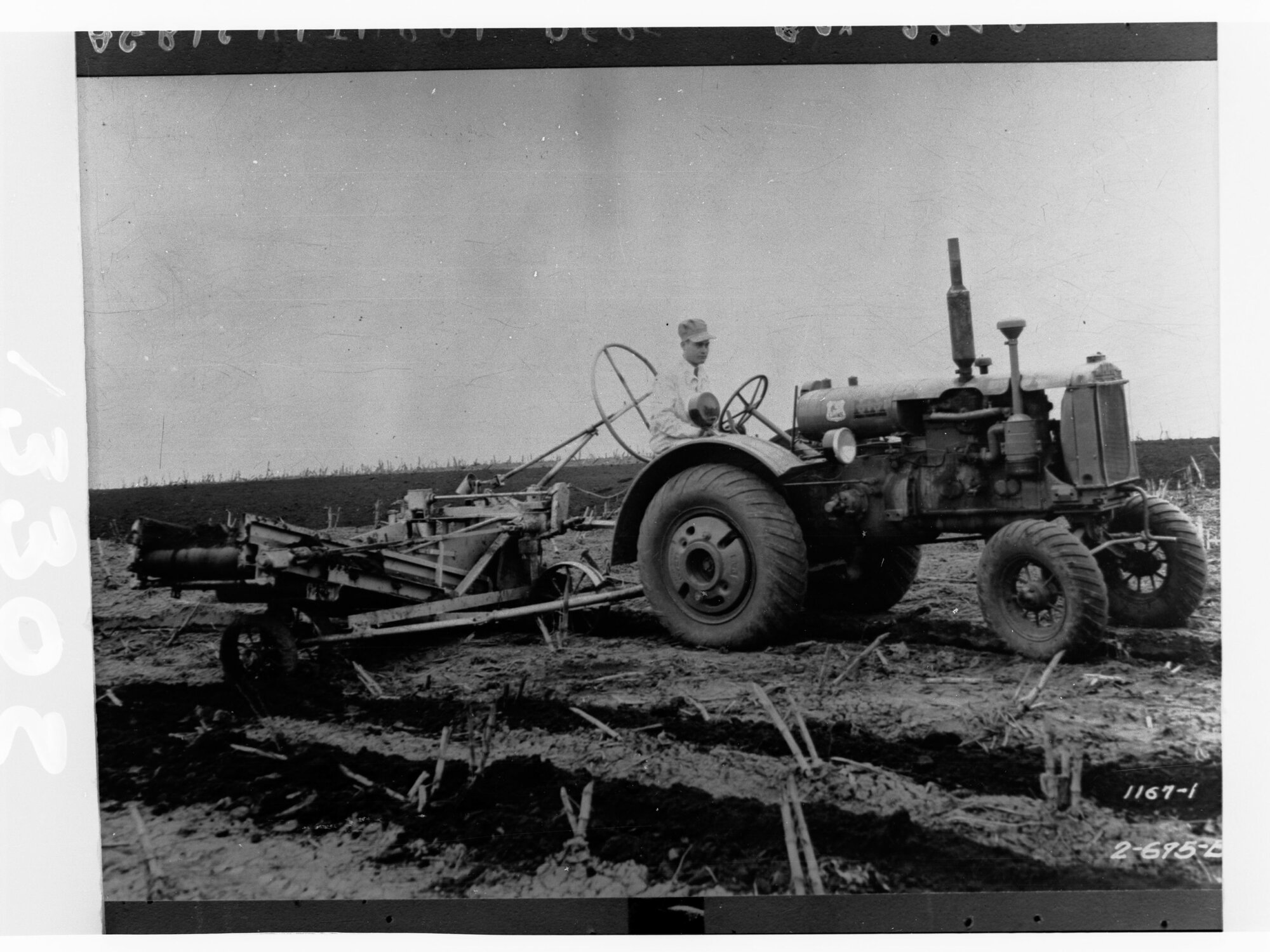Tractor ploughing field