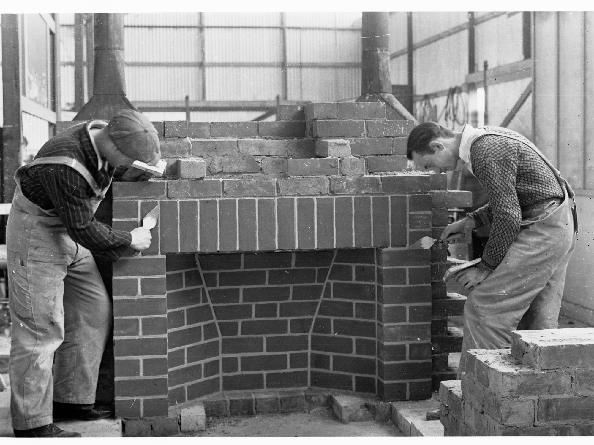 Education Department Trade School showing students doing brickwork