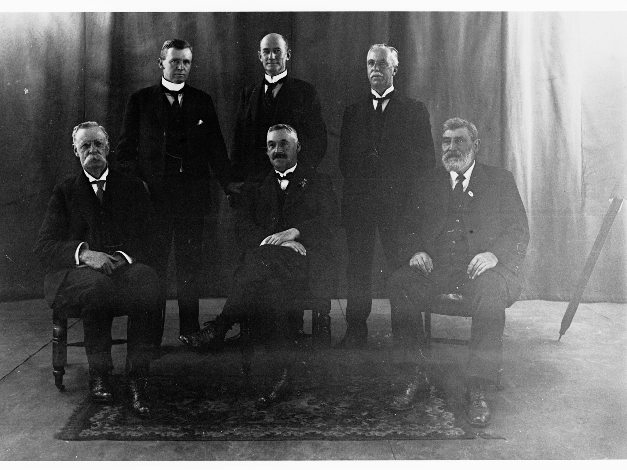 Group photograph of Barwell Ministry - shows H N Barwell, G Ritchie, E A Anstey, R Butler, A H Peake and J G Bice