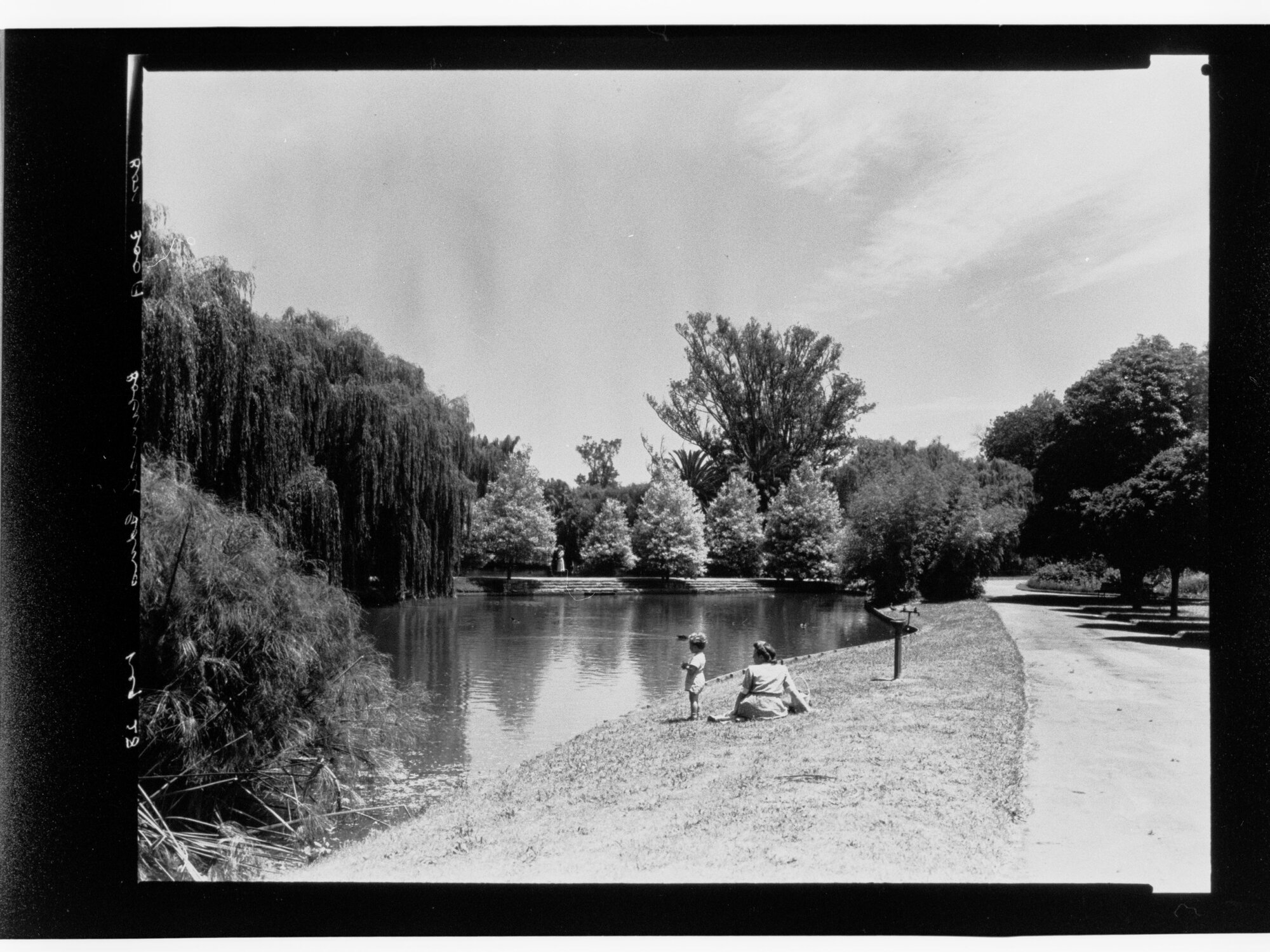 Botanical Gardens - woman and child sitting next to water