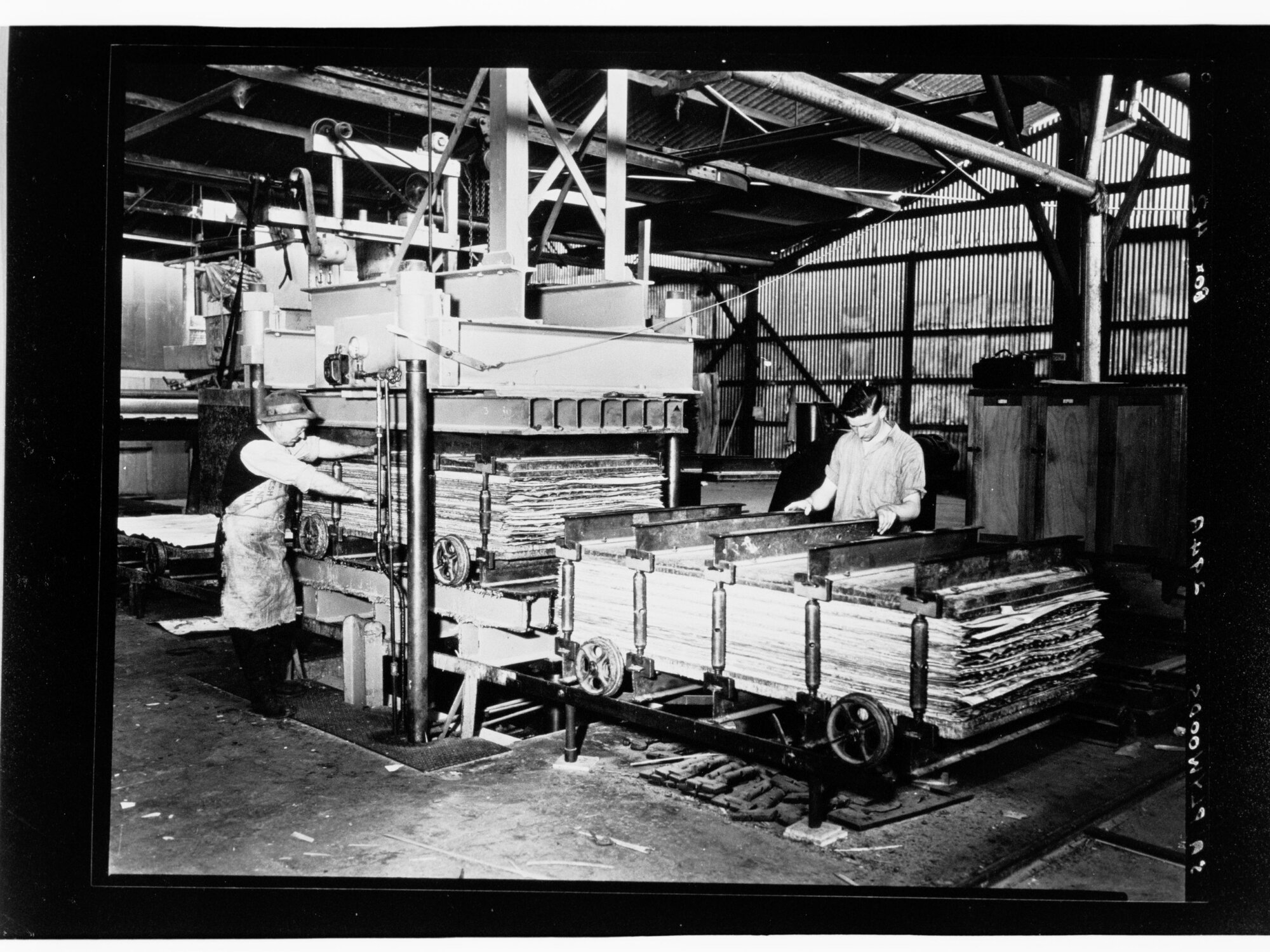 S.A. Plywoods - employees using equipment