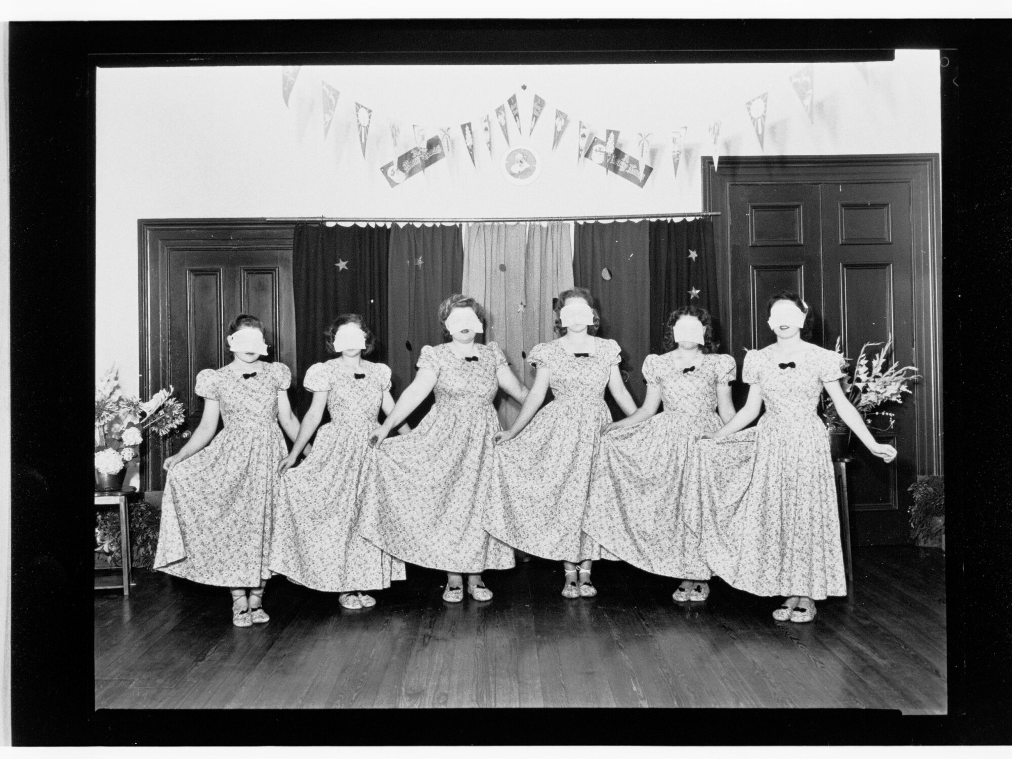 Children's Welfare Department - young women dancing wearing masks