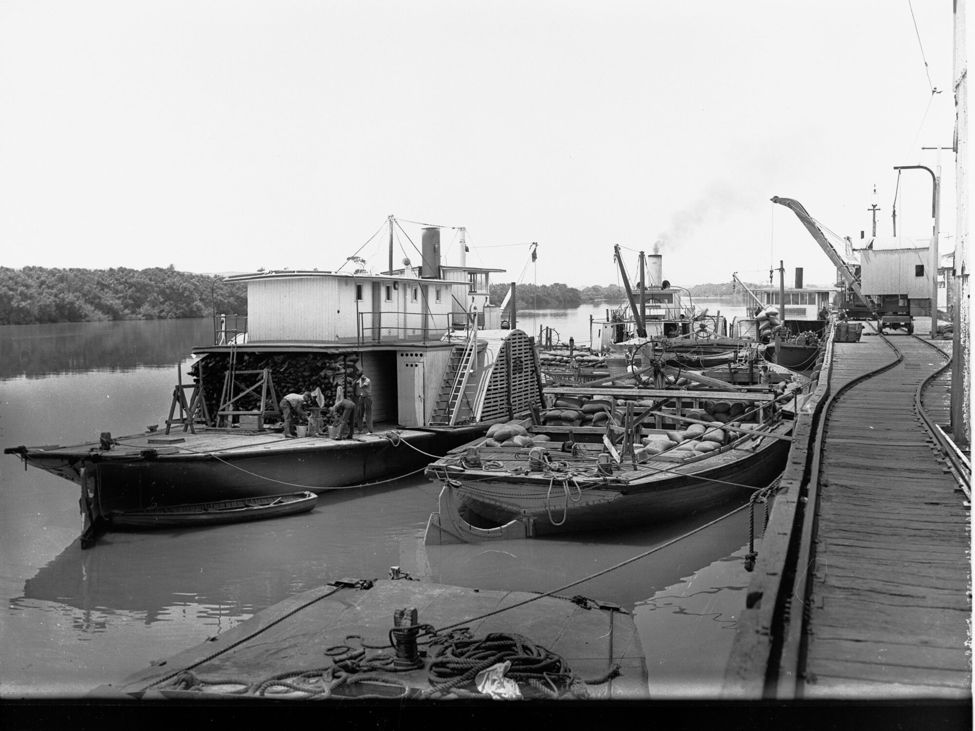 Paddlesteamers on the River Murray loading up with goods.