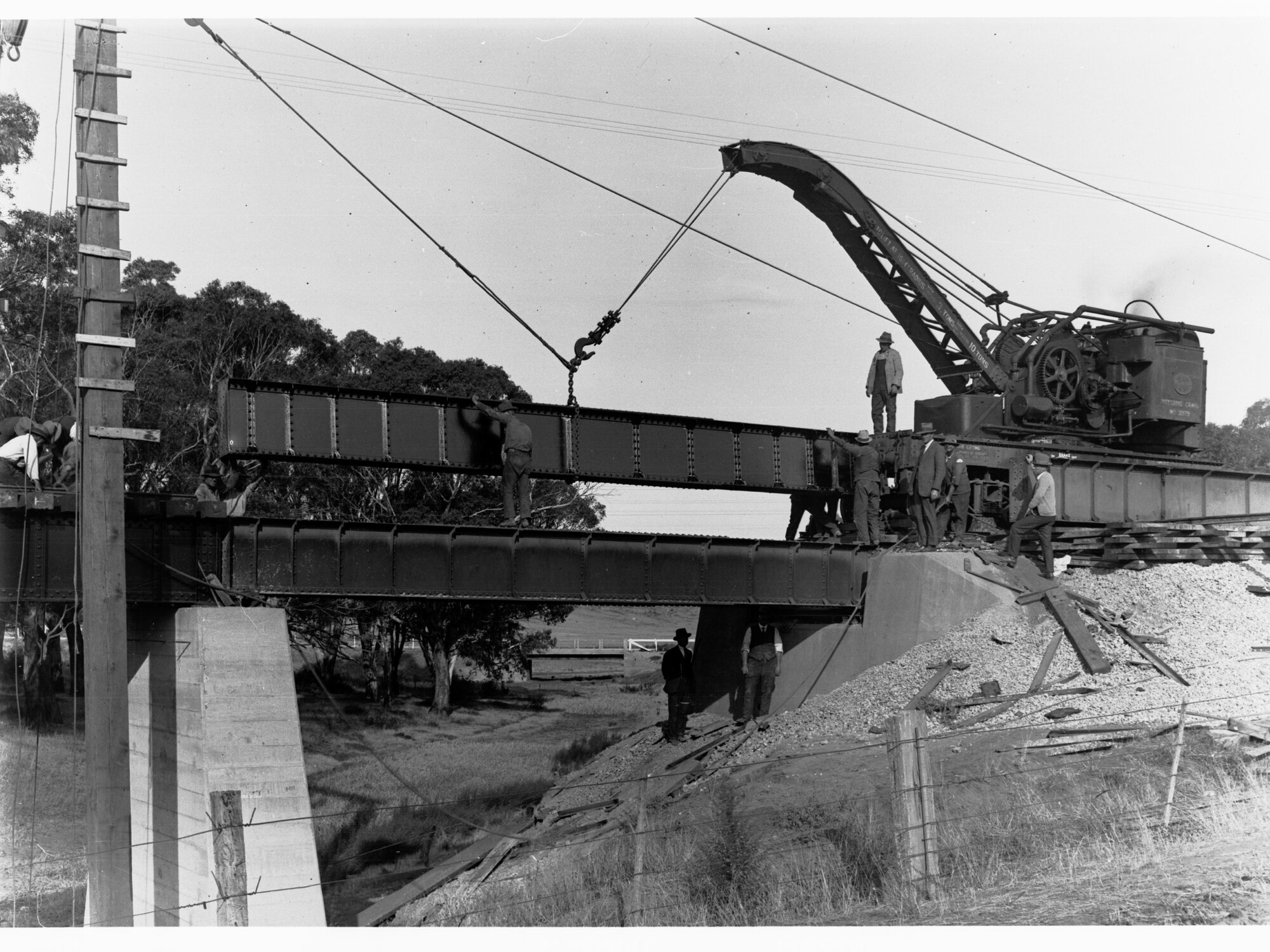 Railway Bridge over Pine Creek showing men working
