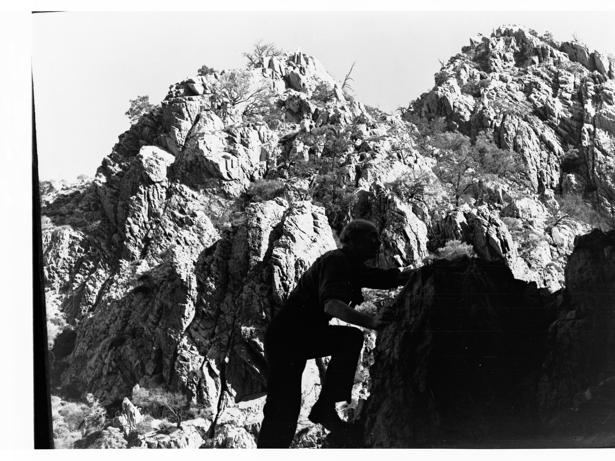 Man Climbing on MacDonnell Range