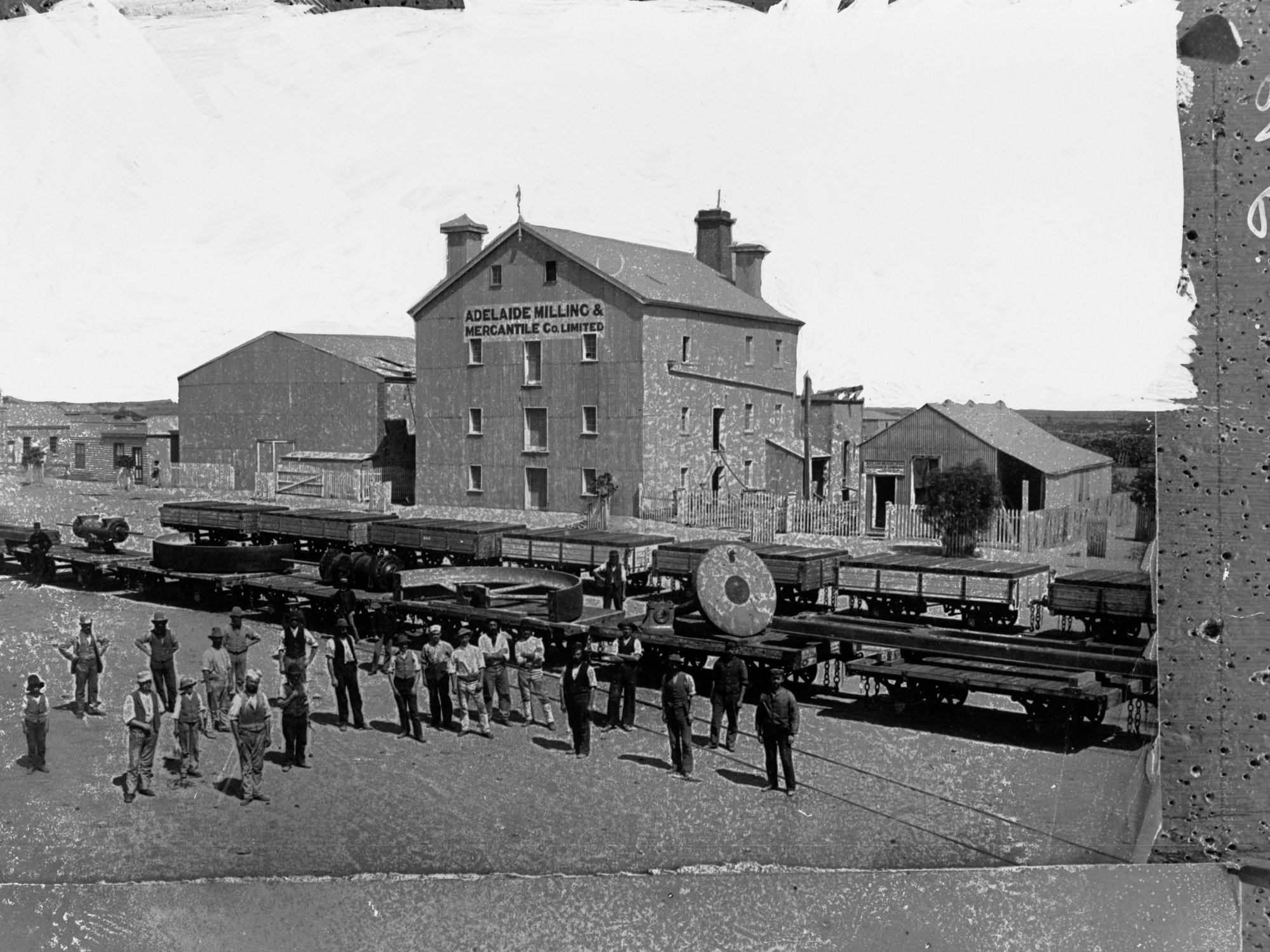 Adelaide Milling and Mercantile Co. Ltd,  Port Pirie - men standing outside in a group