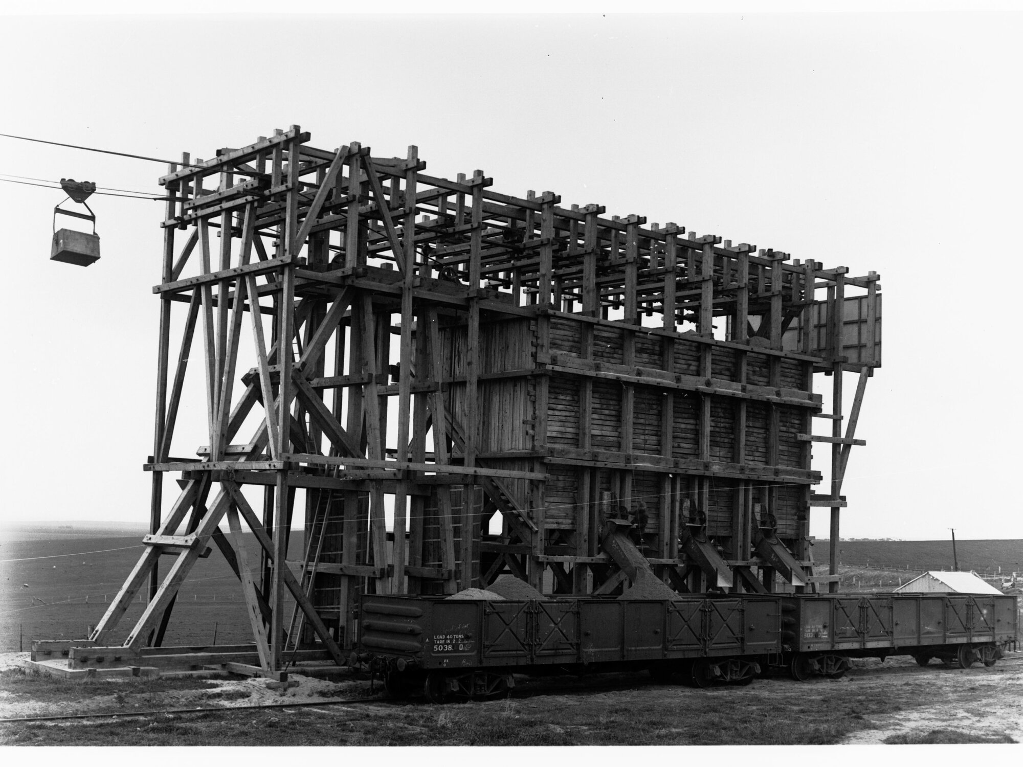 Noarlunga Sand Company loading railway trucks with sand
