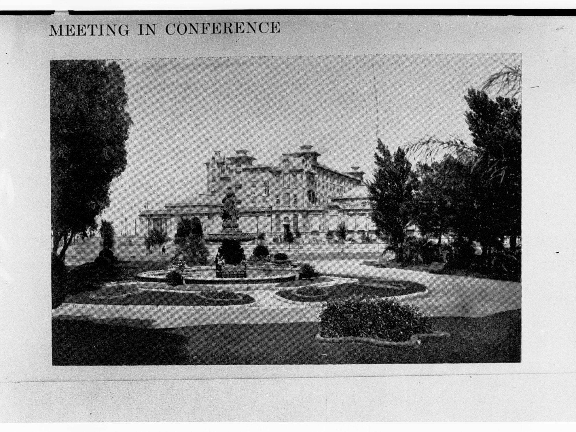 Meeting in Conference in a building in Argentina - showing a courtyard with a large building in the centre