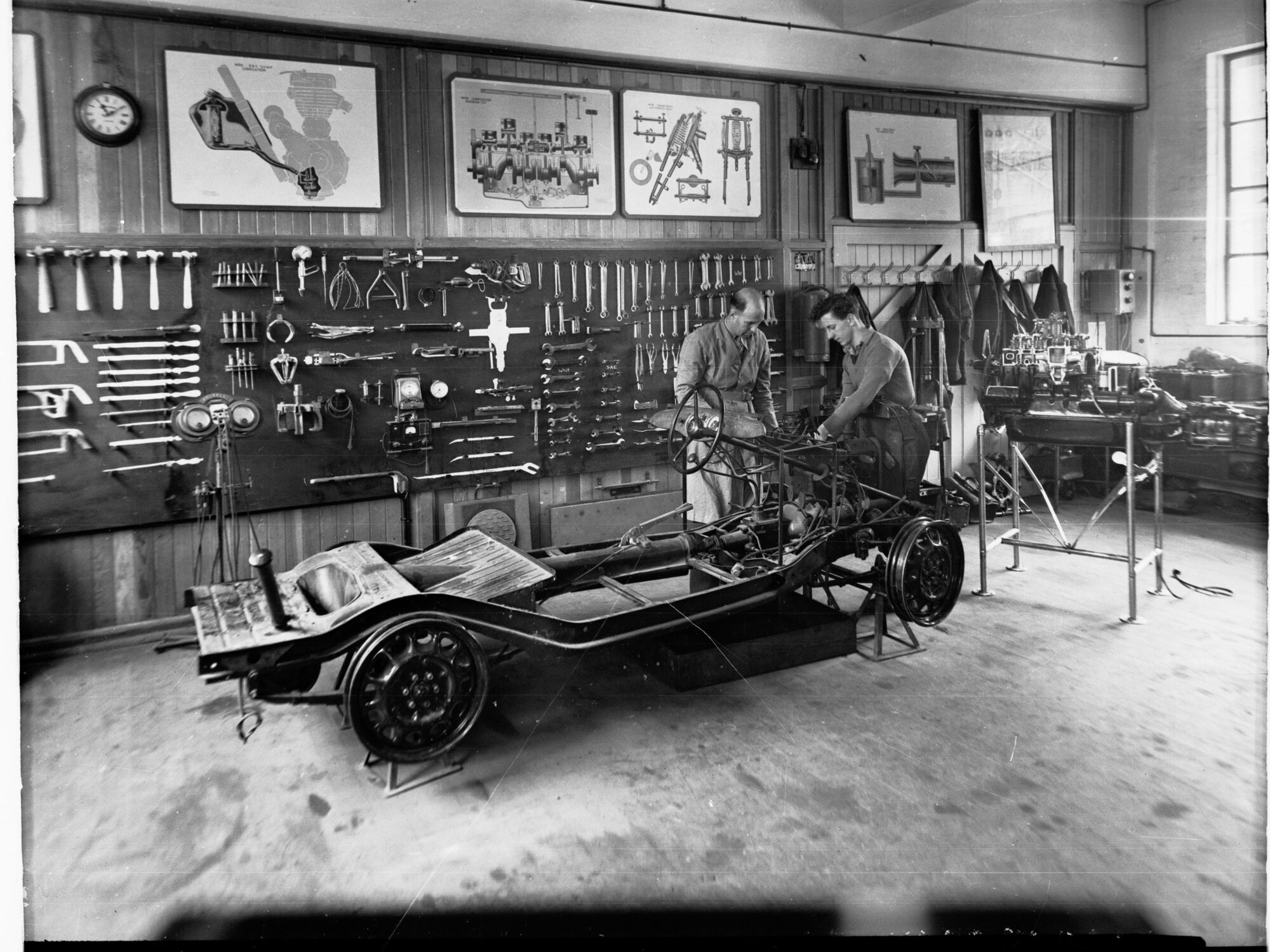 Engineering Trade School Examining Automobile Chassis