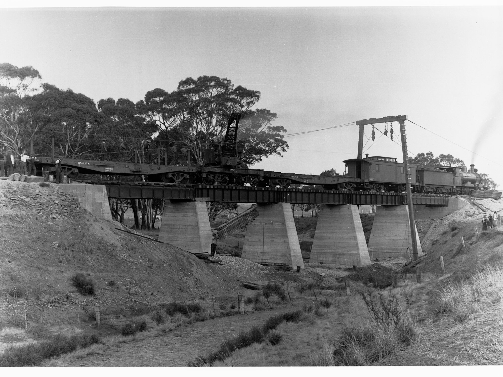 Railway Bridge over Pine Creek showing men working and large crane