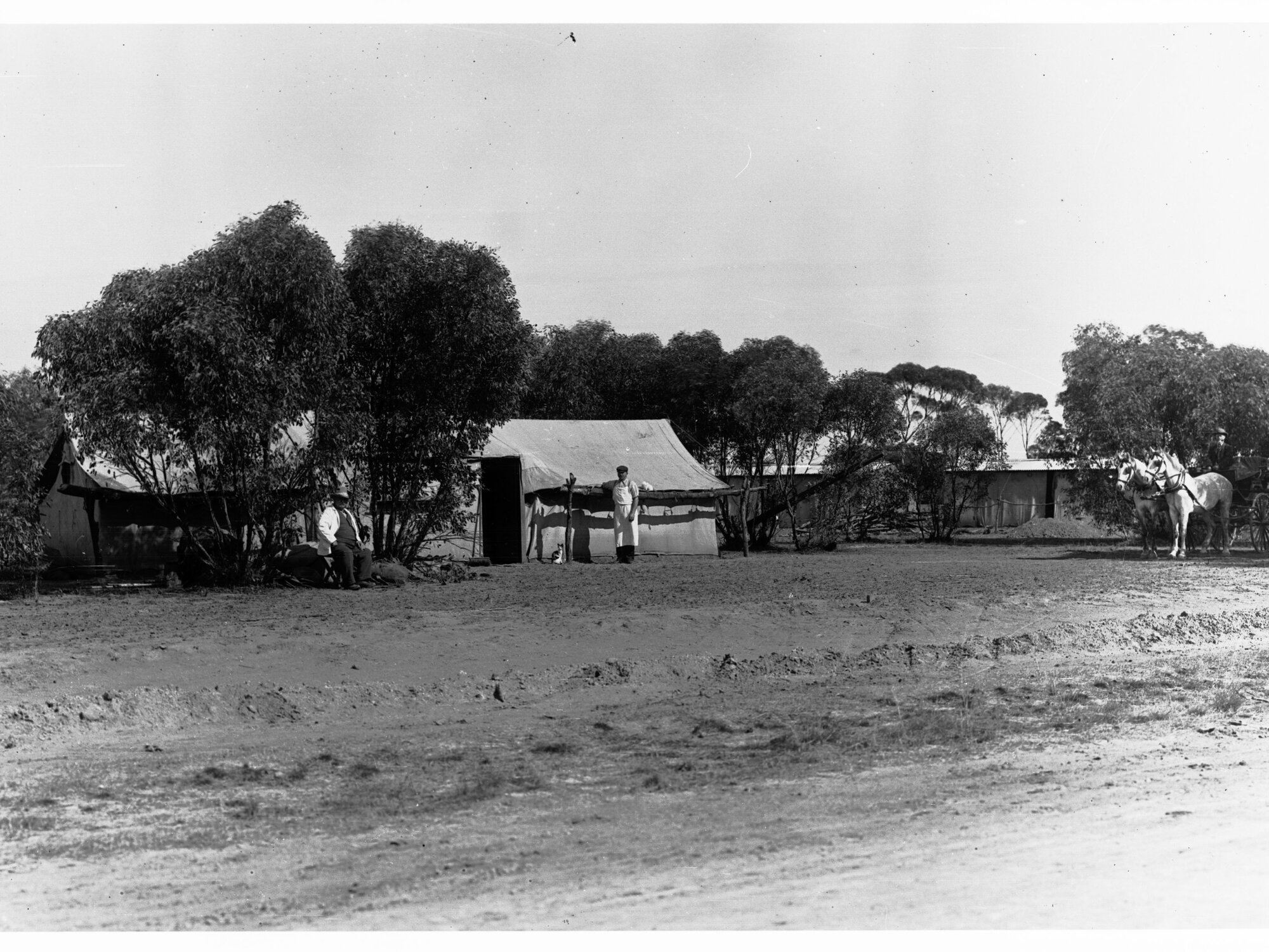 Men at Camp Site With Horse and Cart