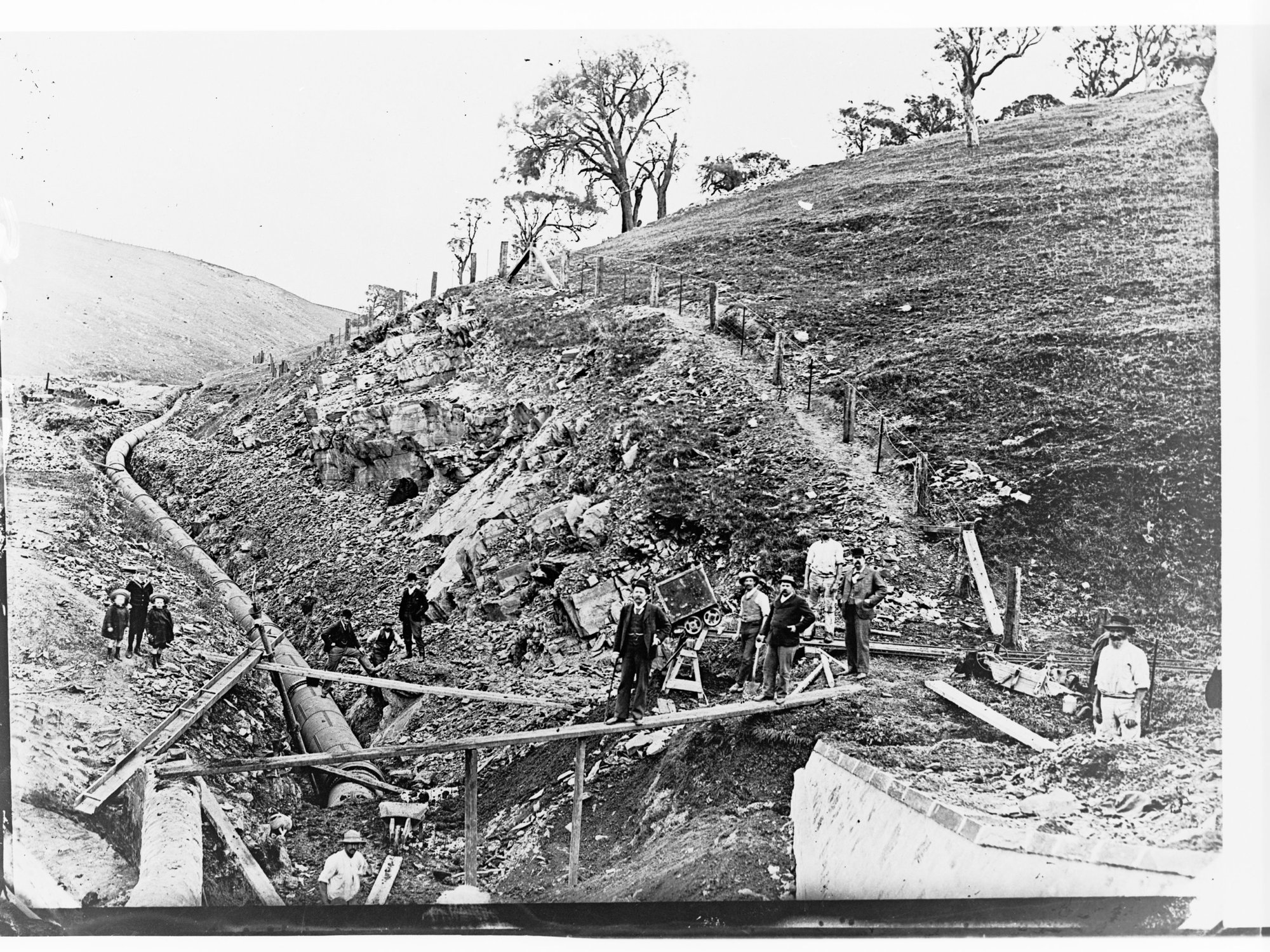 Happy Valley Waterworks - laying of pipeline and men at work