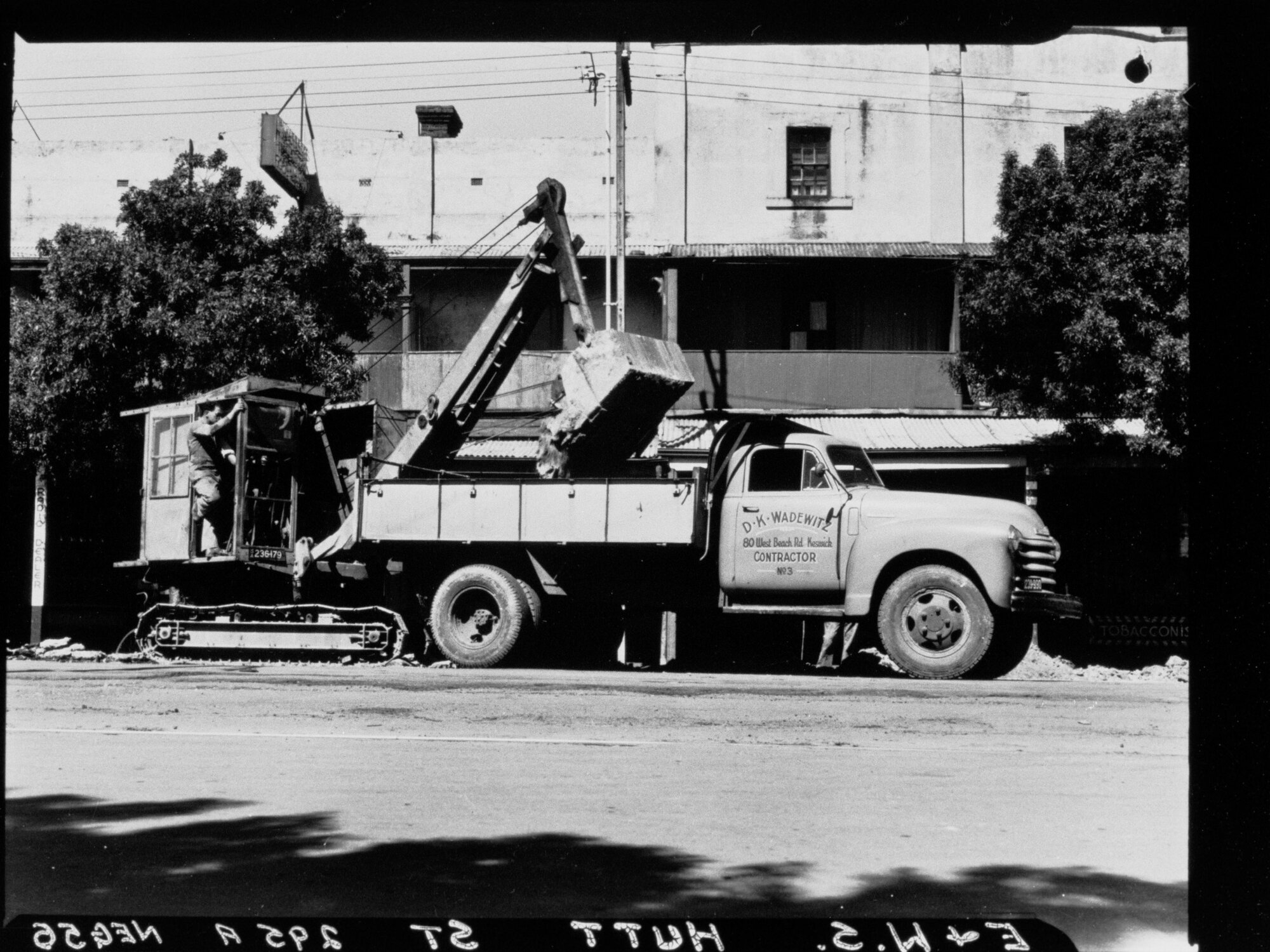 Truck and grader (name on truck is D K Wadewitz, Contractor, 80 West Beach Road, Keswick)