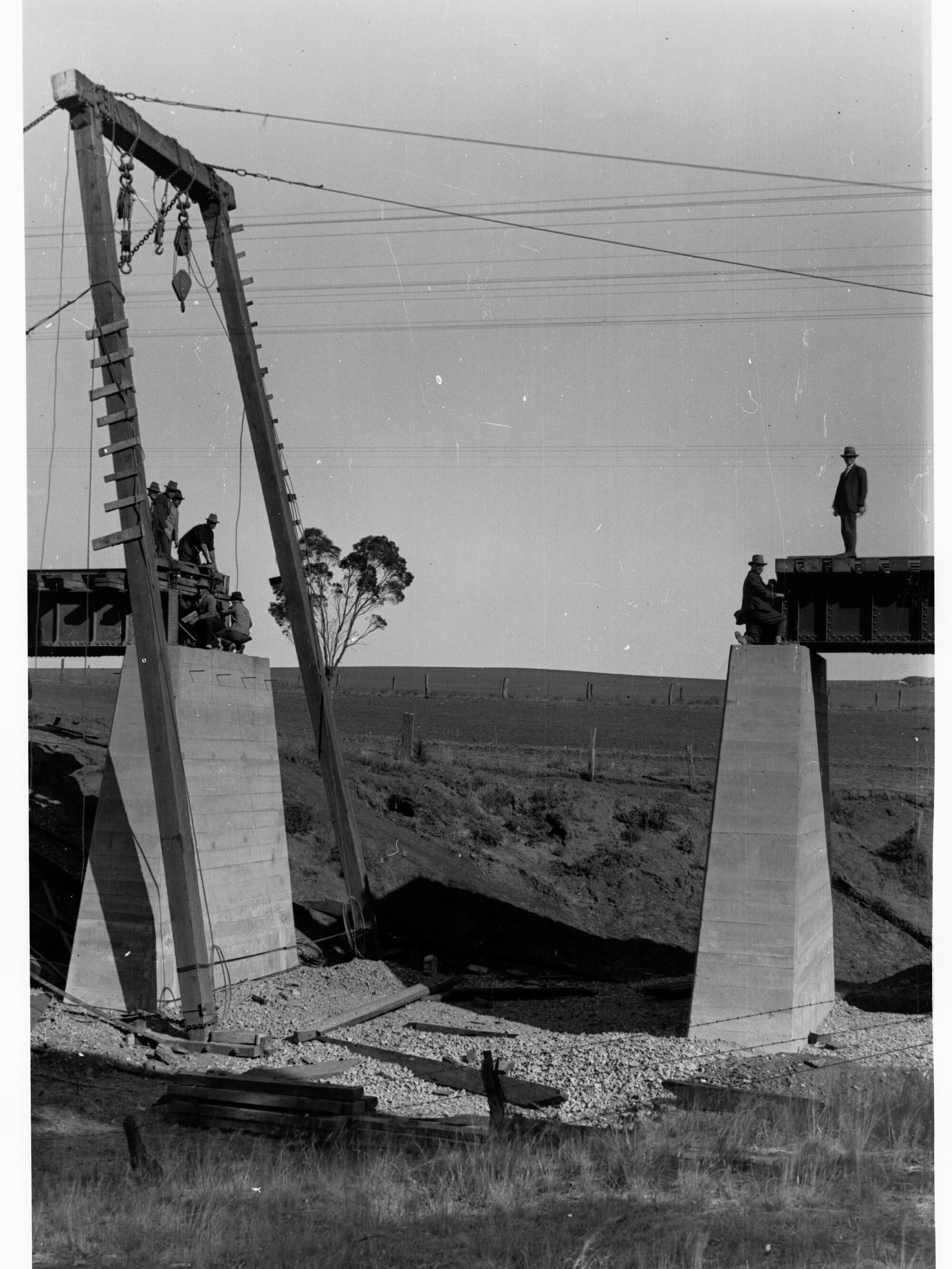 Railway Bridge over Pine Creek showing men working