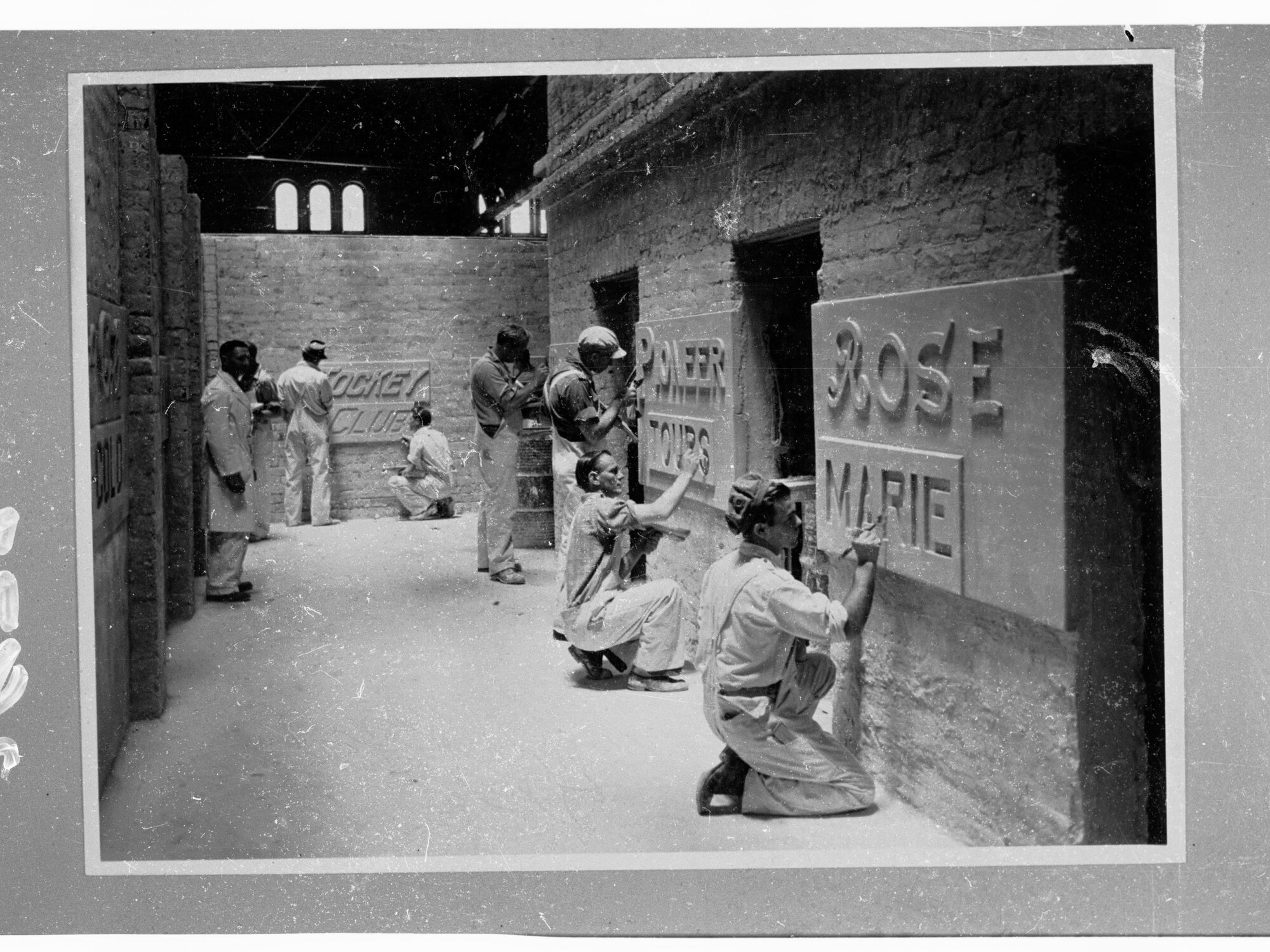 Reconstruction training school - Education Dept. - shows men carving in stone