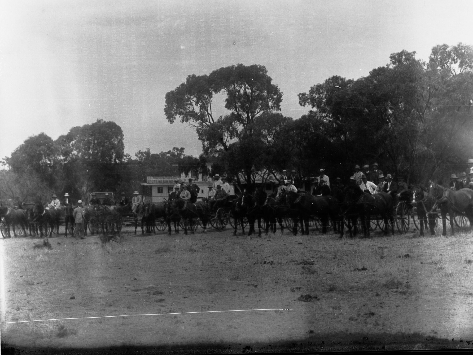 Lots of people in carriages near a paddlesteamer - River Murray
