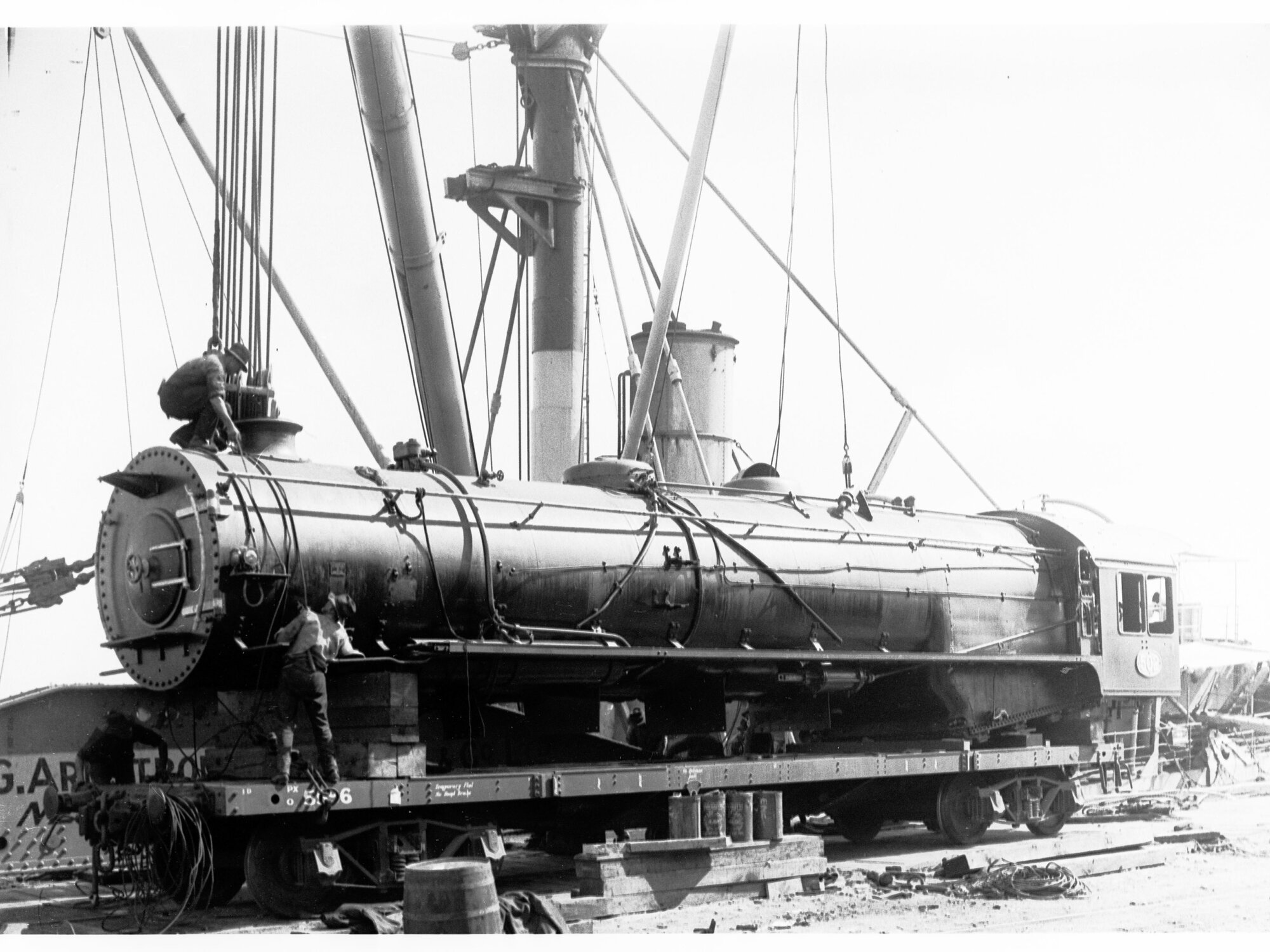 Unloading new railways engines from ship SS Beldis (SAR 600 Class Locomotive)