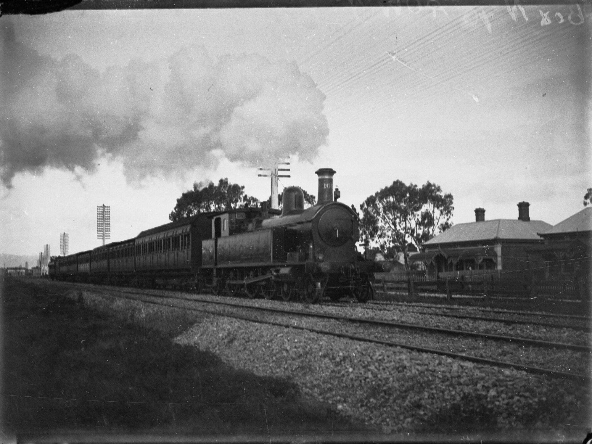 "F" class 4-6-2 tank engine on down track. Port train at West Croydon.