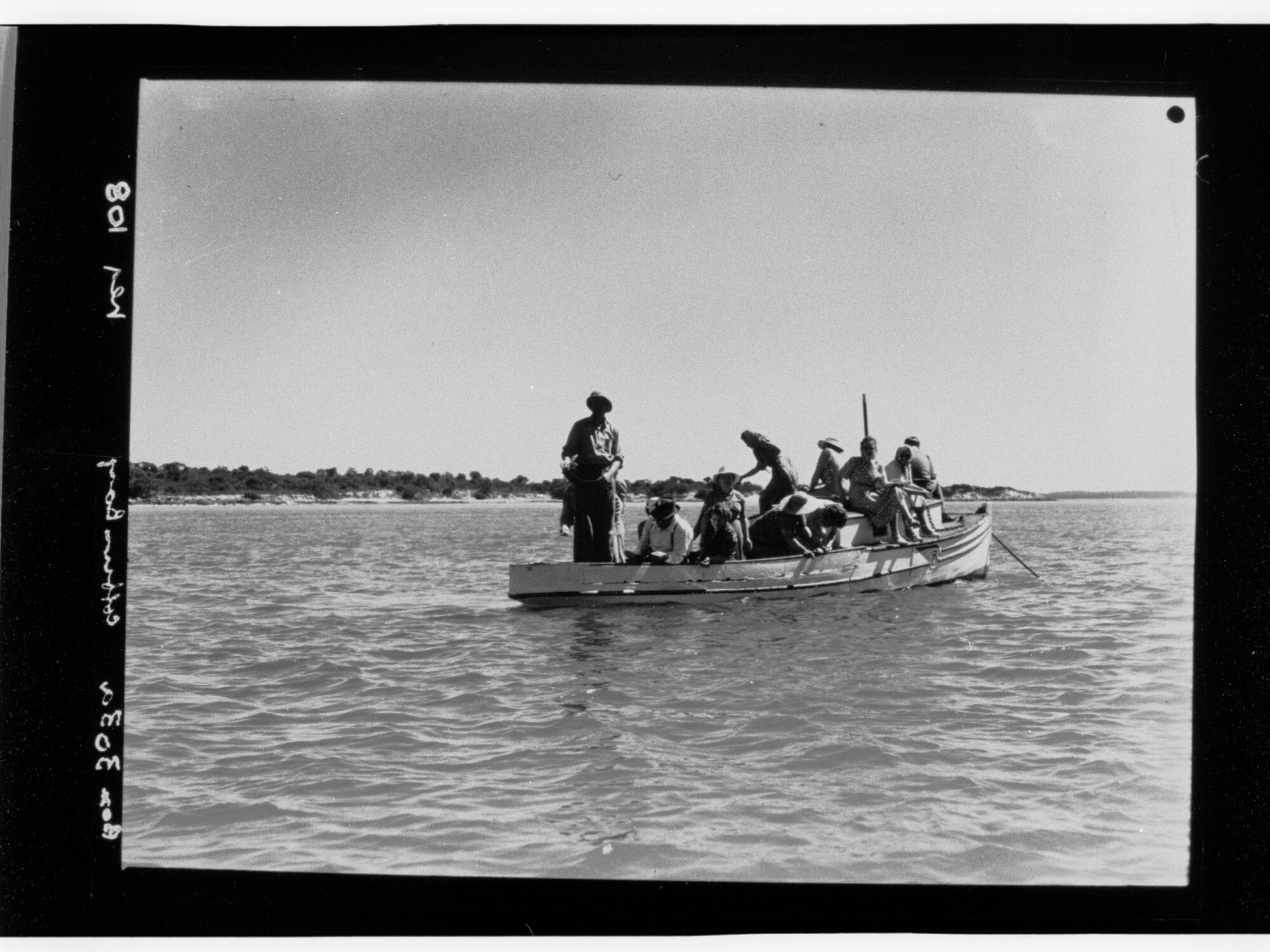 Men and women in small boat, Coffin Bay