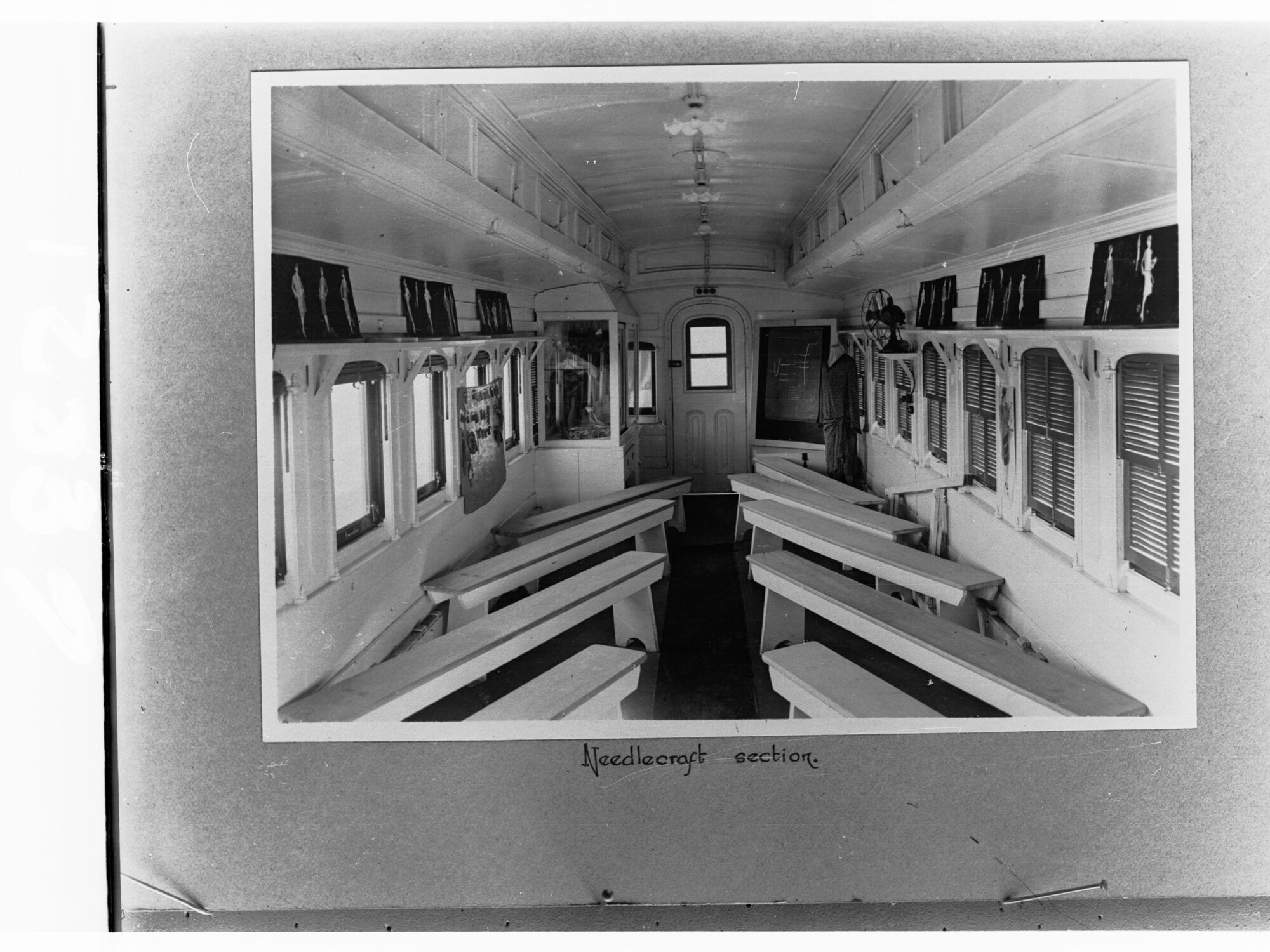 "Victorian Better Farming Train" - Interior of the train, the Needlecraft Section.  Copied for the Agricultural Department