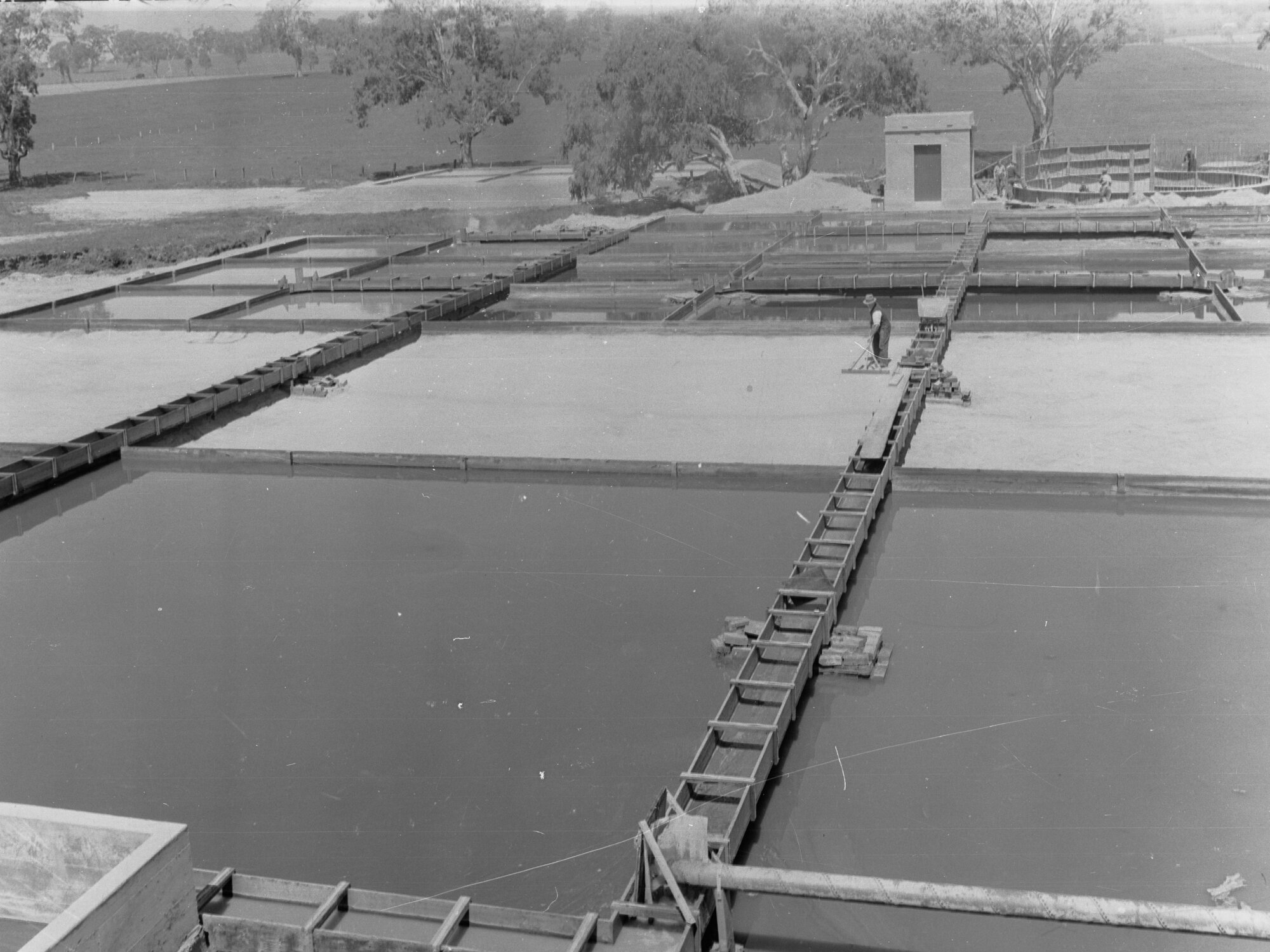 Sewers department treatment works, Woodside, man working
