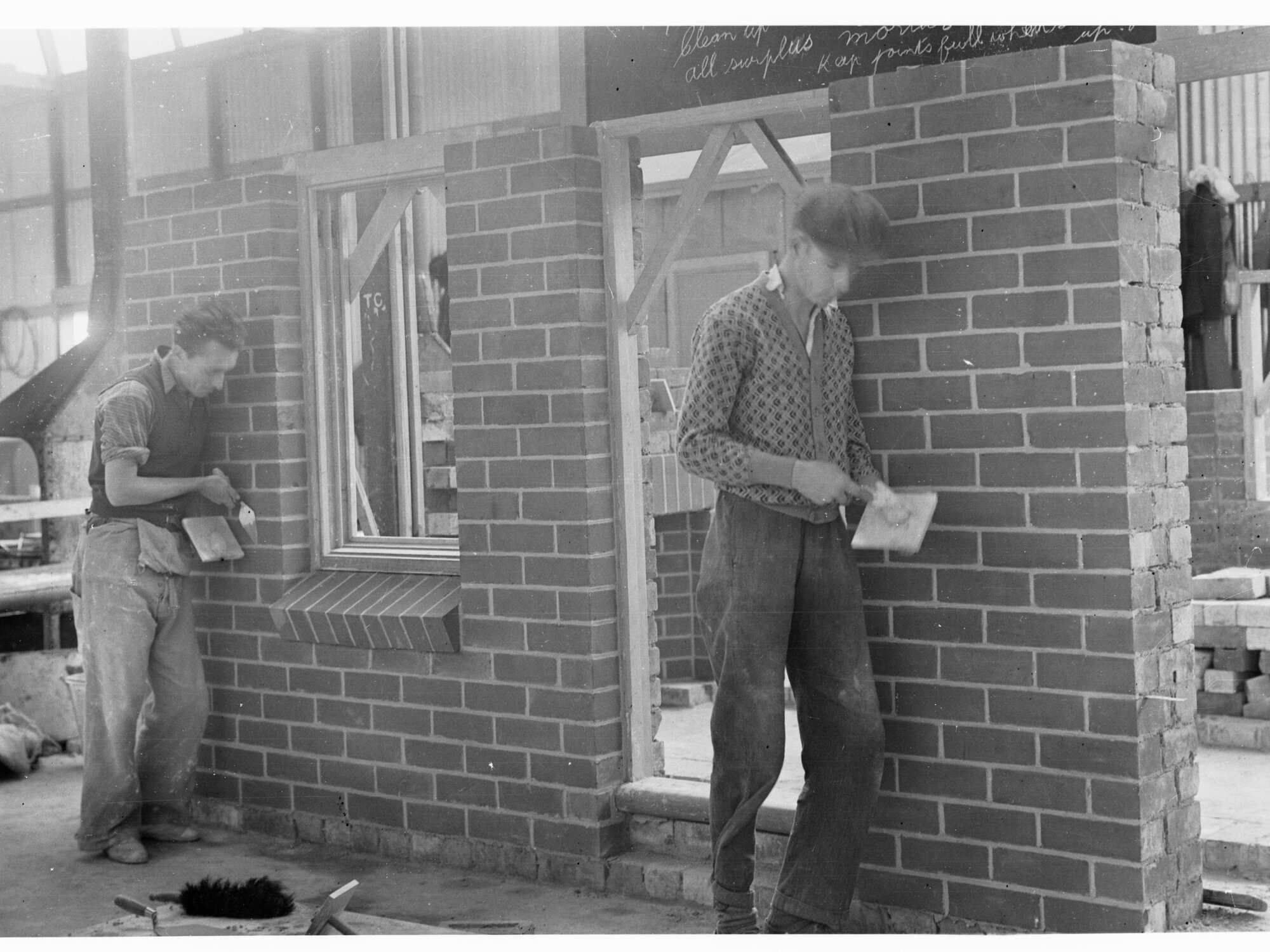 Education Department Trade School showing students doing brickwork
