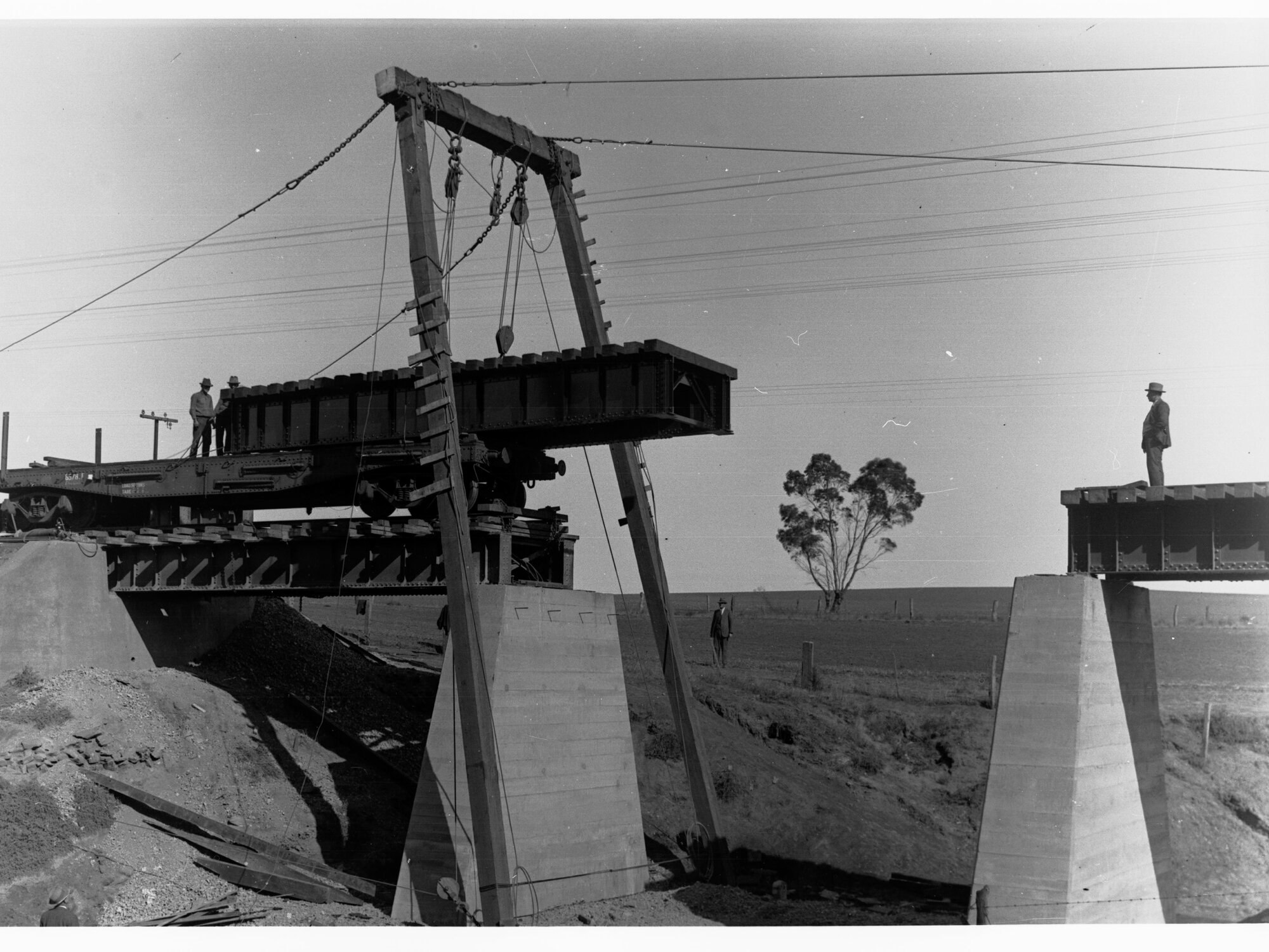 Railway Bridge over Pine Creek showing men working
