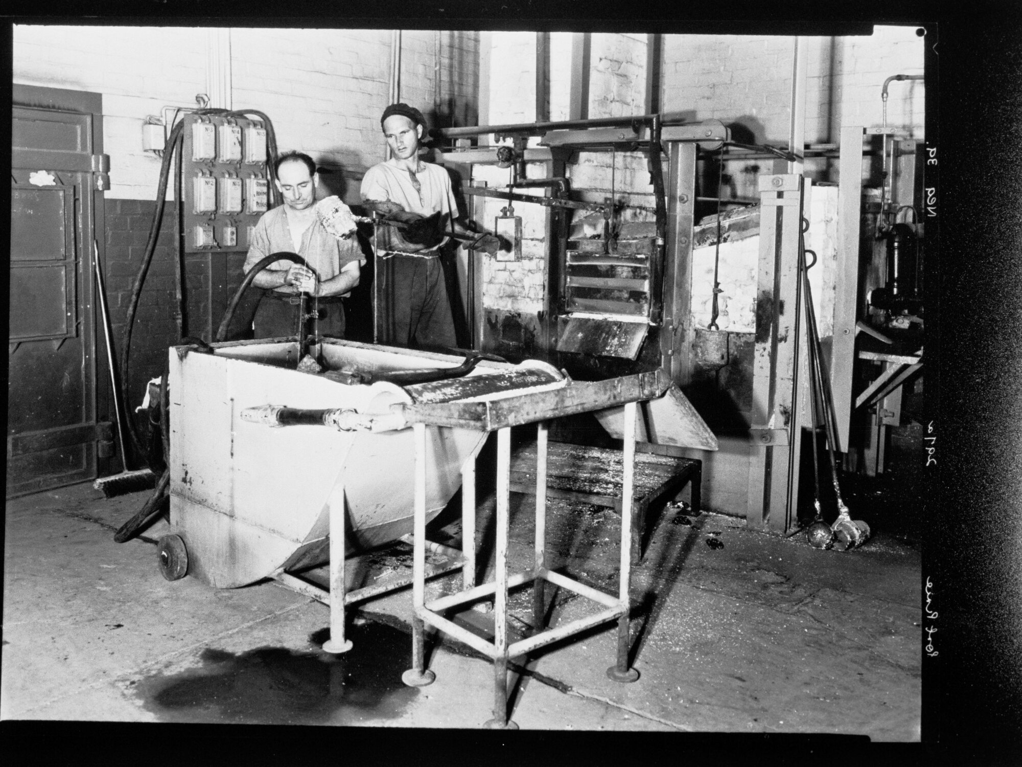 Port Pirie - two men using machinery