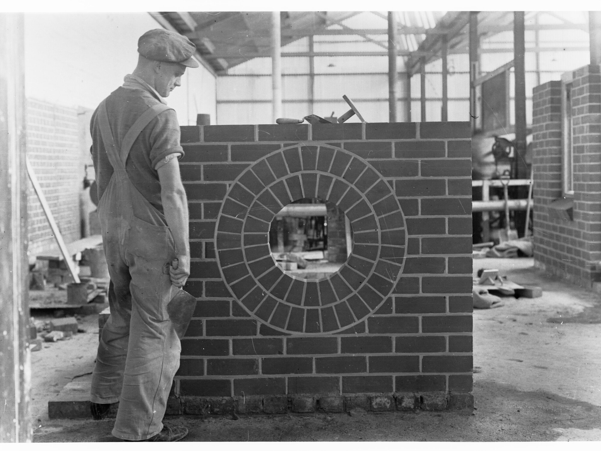 Education Department Trade School showing a man building