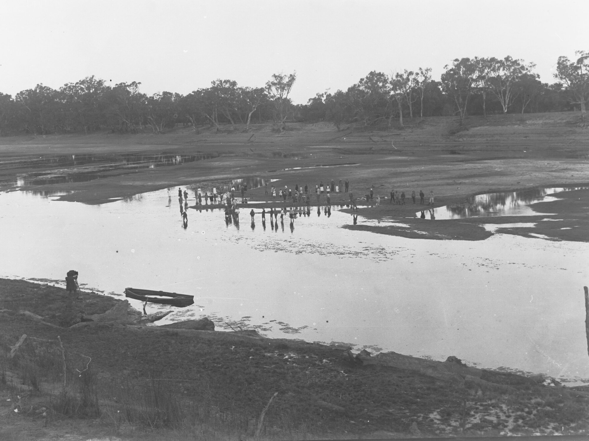 Children on bank of river