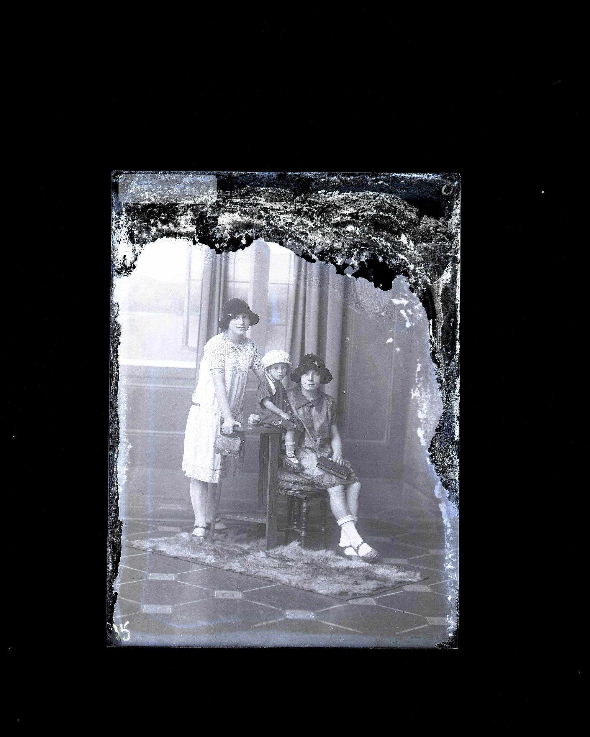 Two Adults &amp; a Child - De Celio