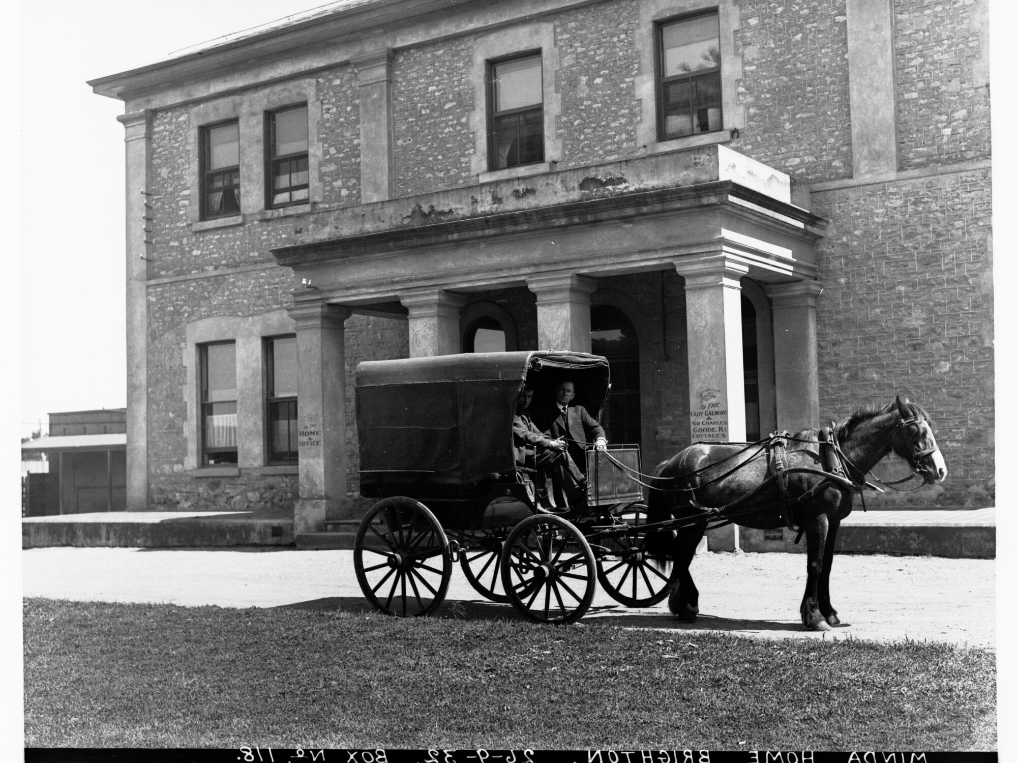 Men in carriage outside Minda Home, Brighton