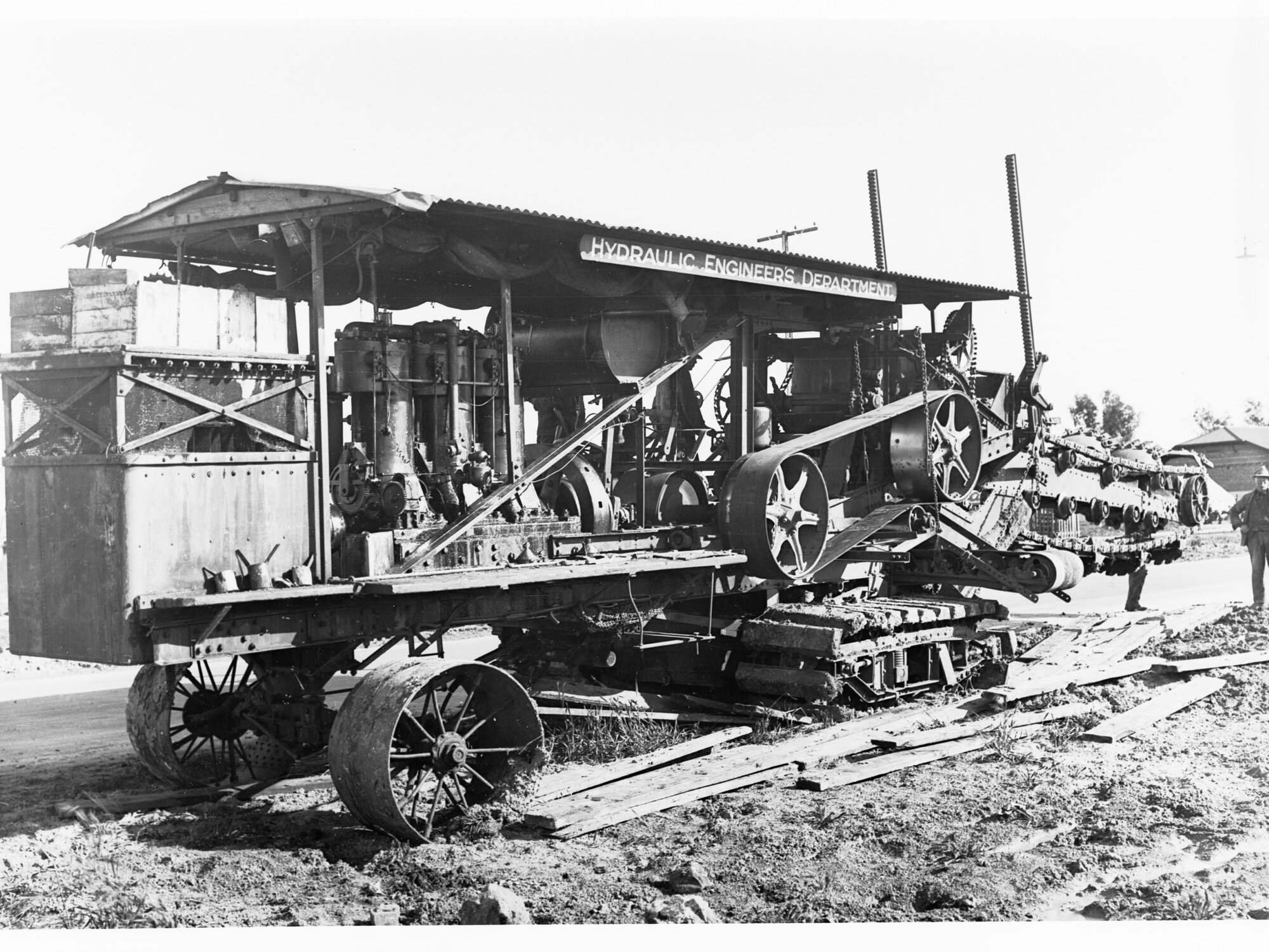 Earthmoving machinery digging ditches at Edwardstown for sewerage