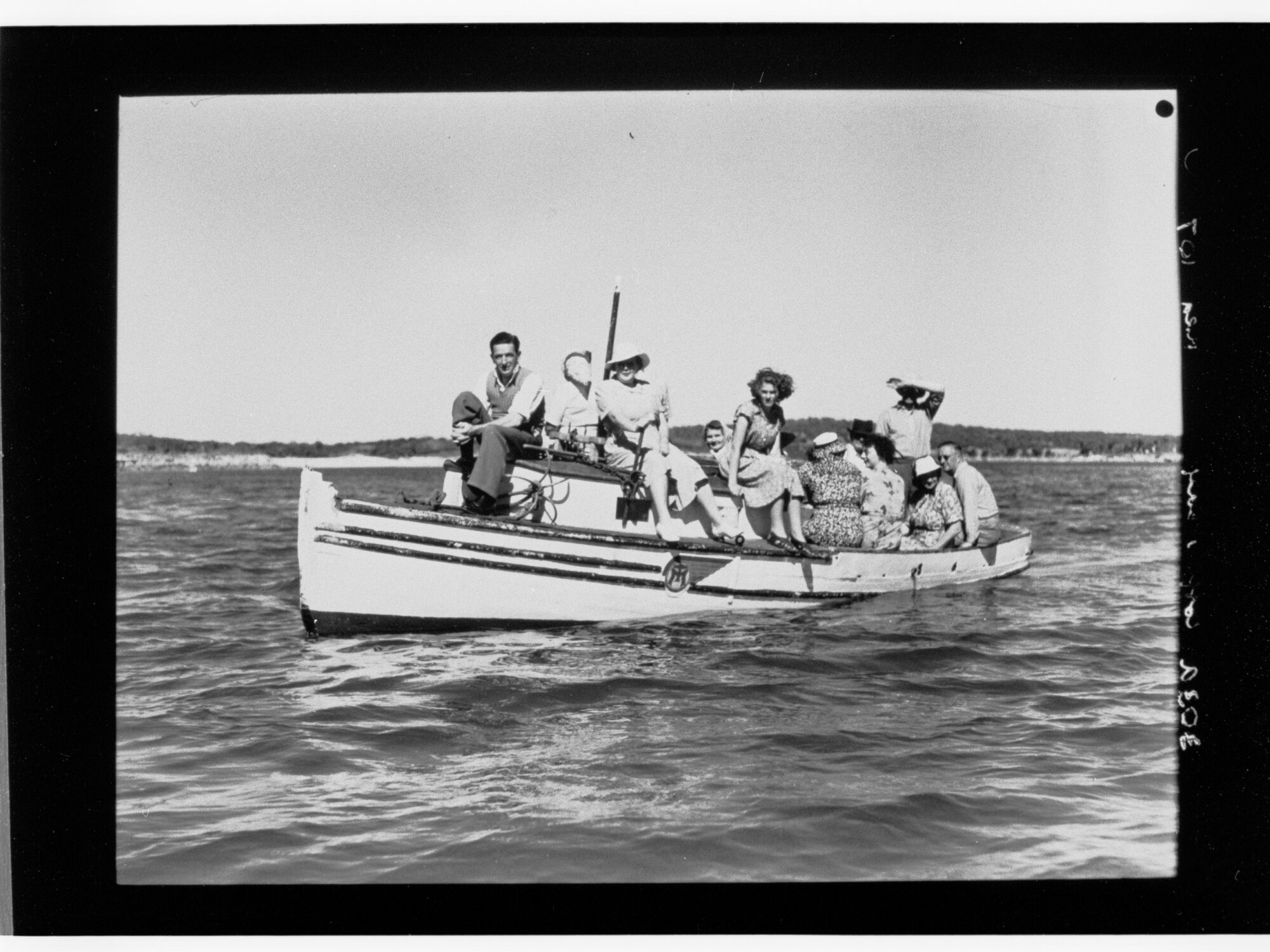 Men and women in small boat