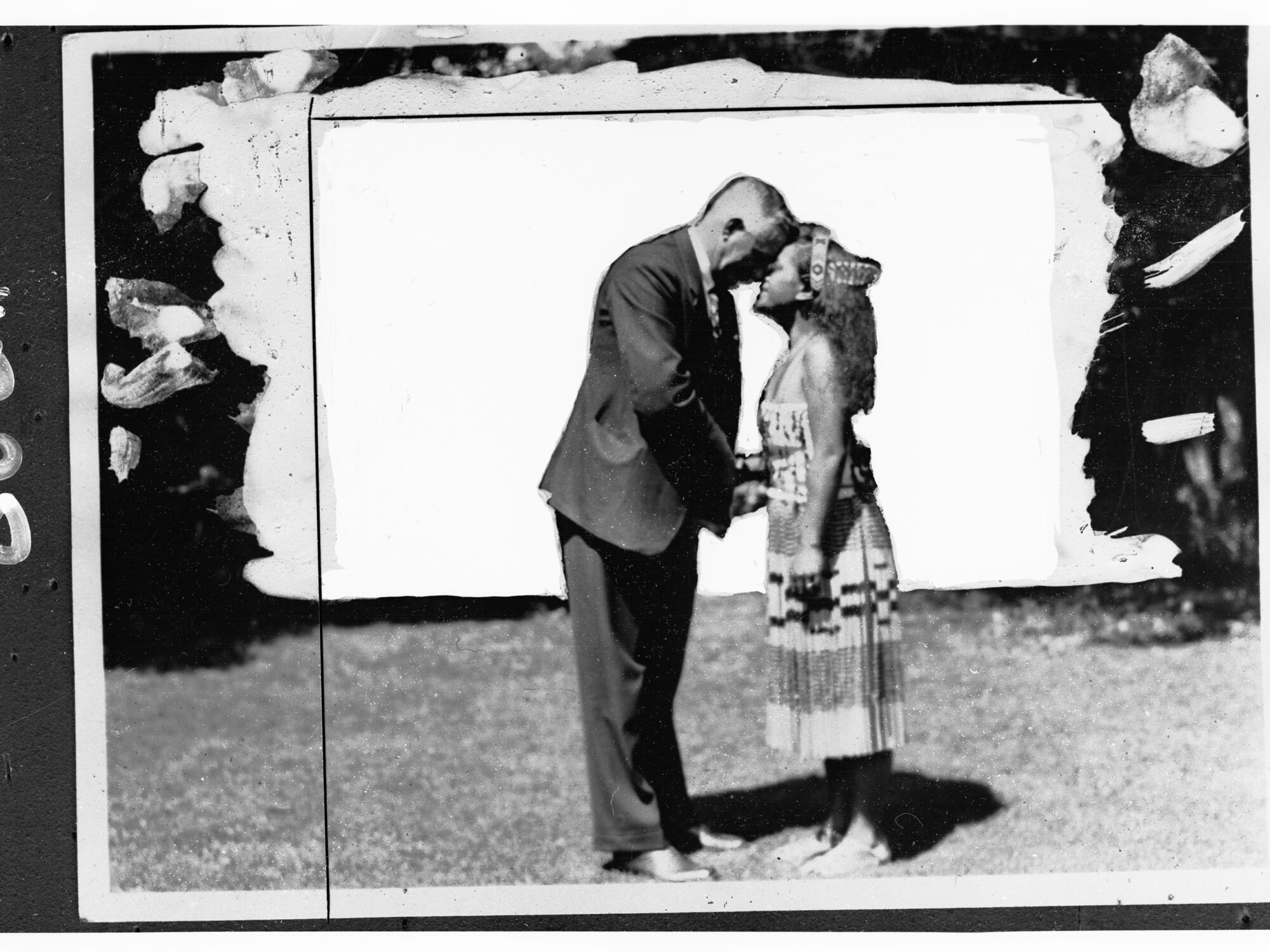 Man Rubbing Noses with Maori Women