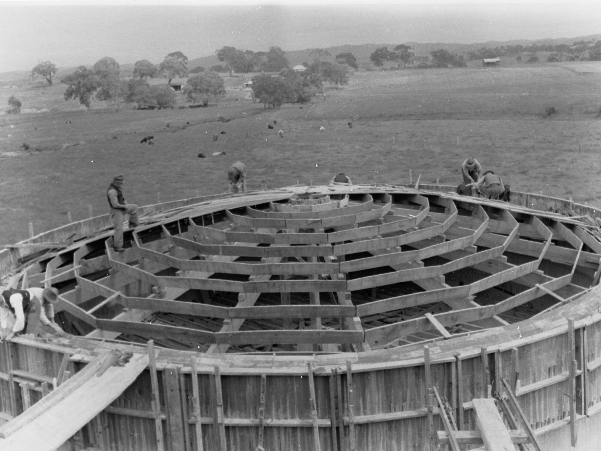 Sewers department treatment works, Woodside, men working