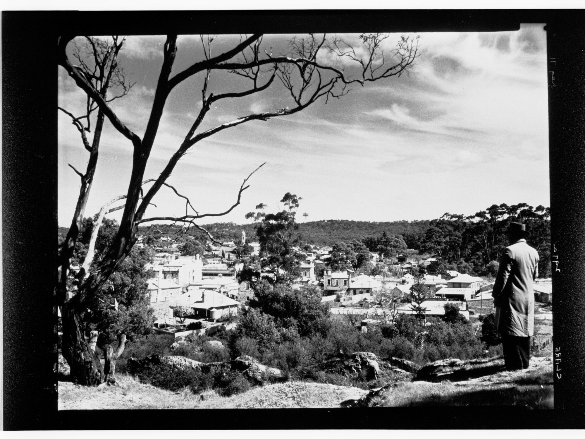 Clare - man on hill looking down towards town