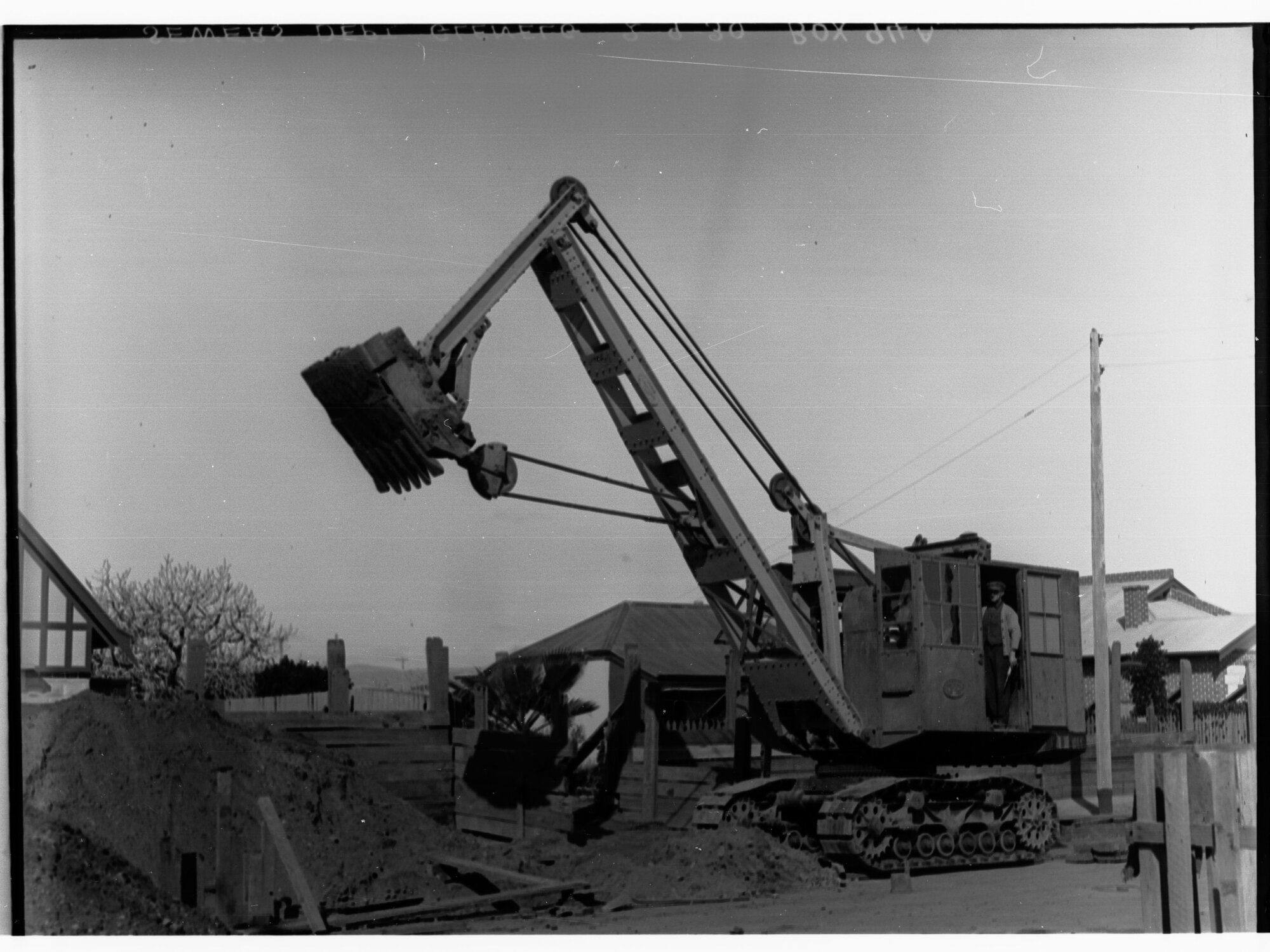 Sewers Department, Glenelg, showing backhoe excavation