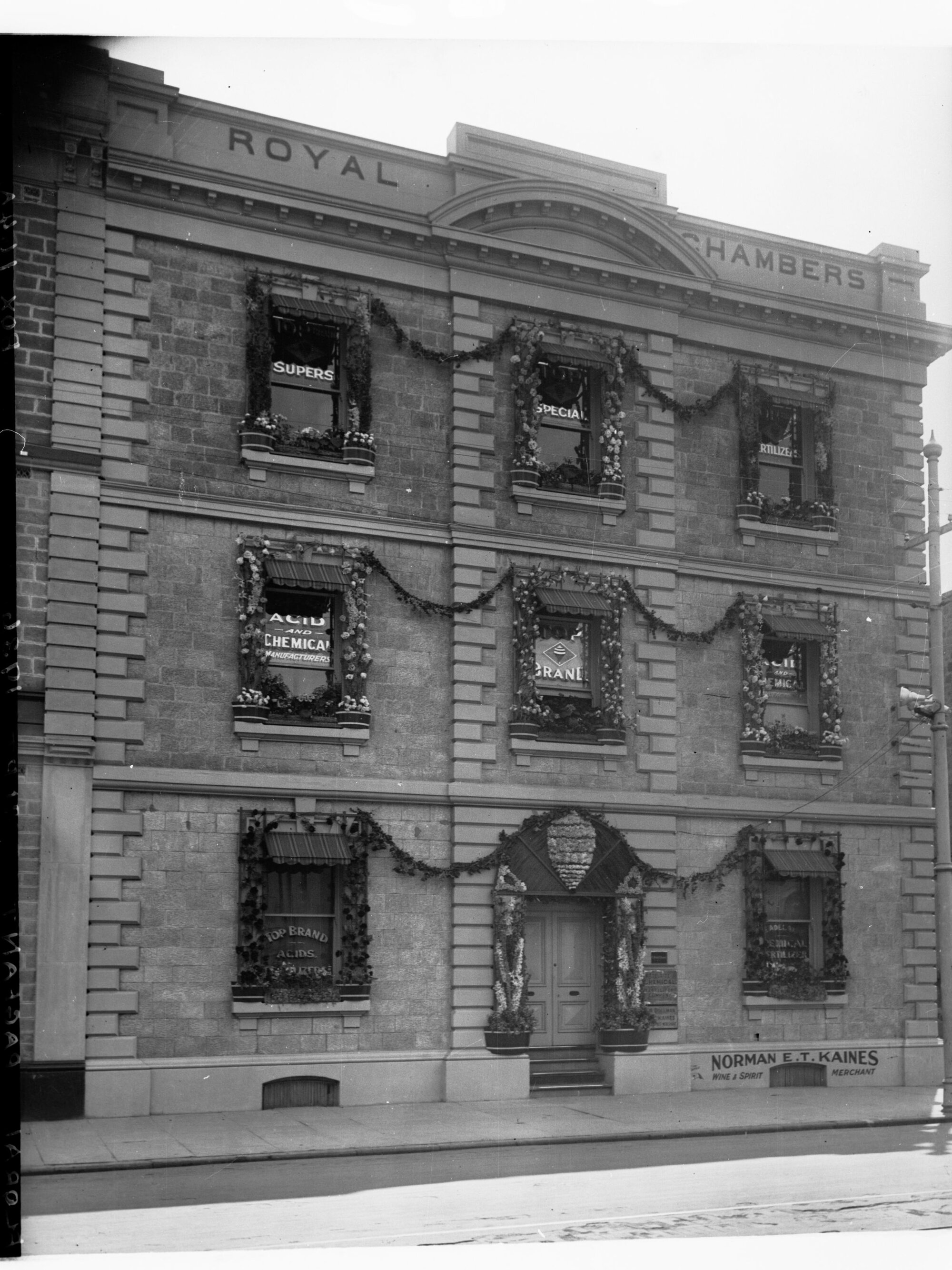 Royal Chambers building on Currie Street decorated for state centenary