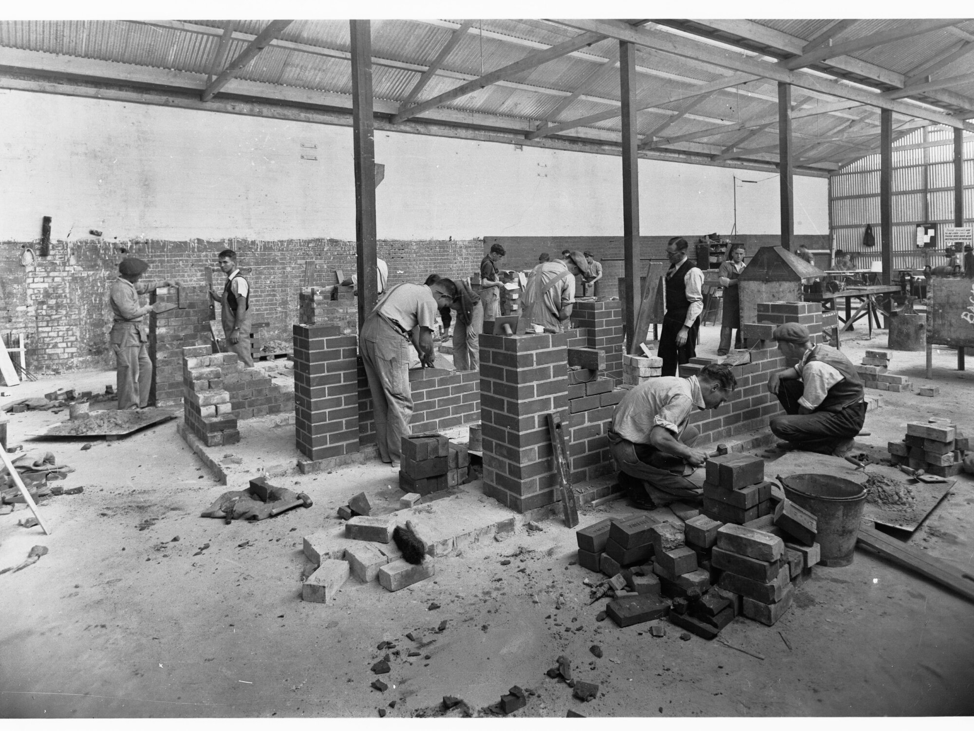 Education Department Trade School showing students doing brickwork