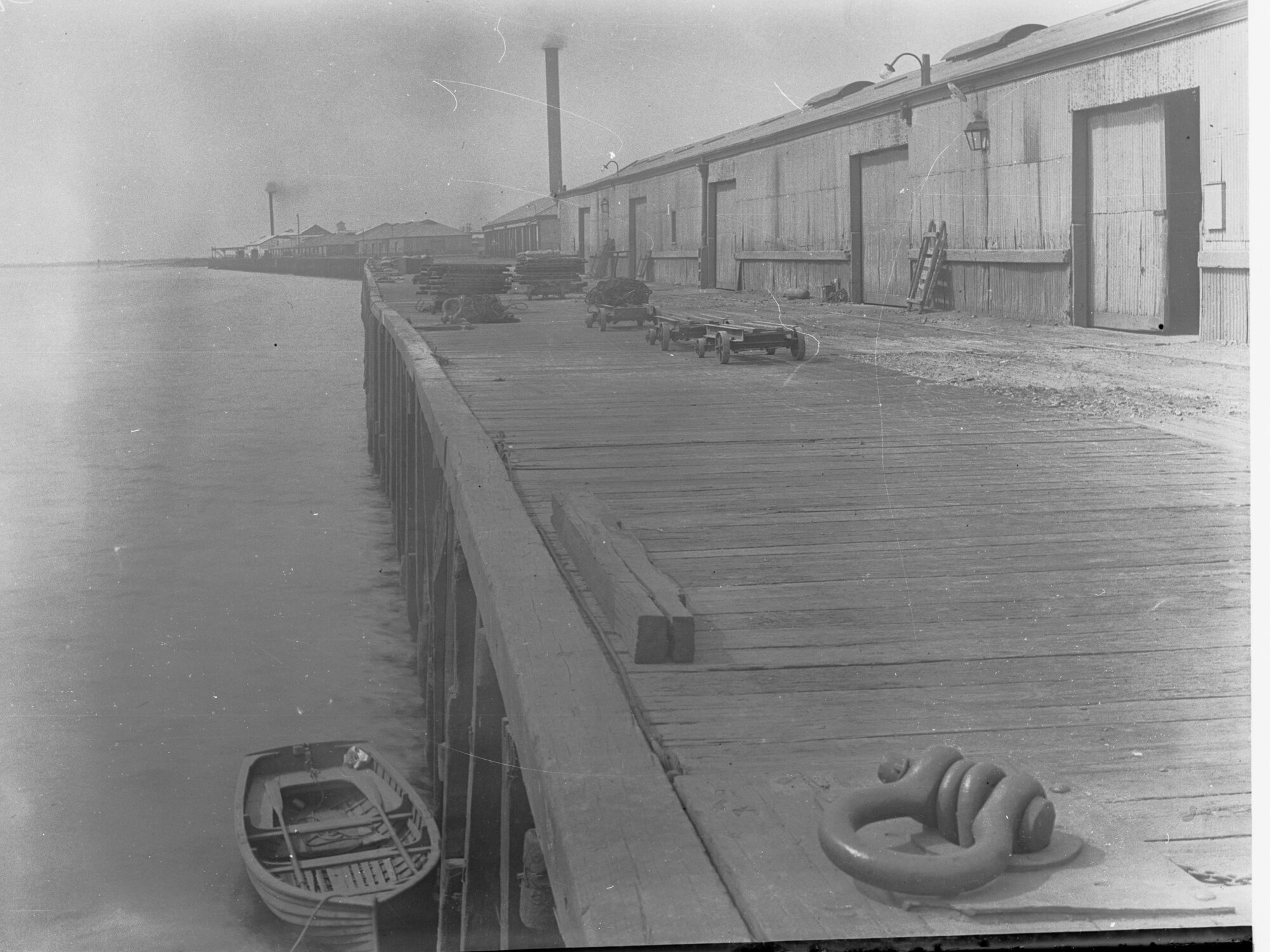 No. 2 quay at Port Adelaide - wharf showing a row boat
