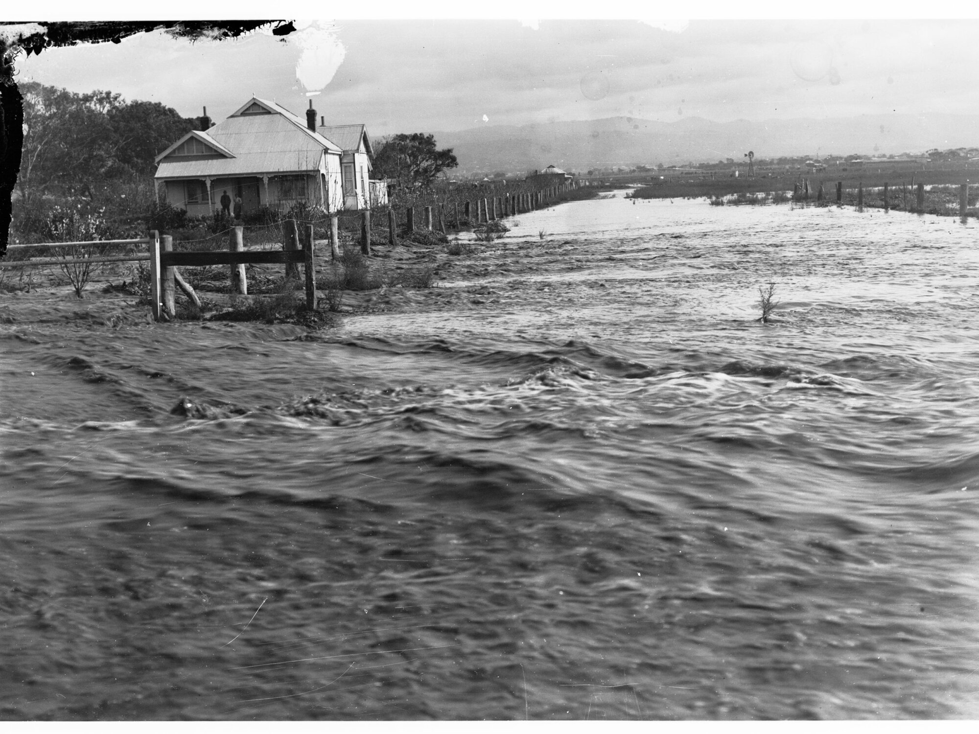 Farmhouse Surrounded by Floodwaters