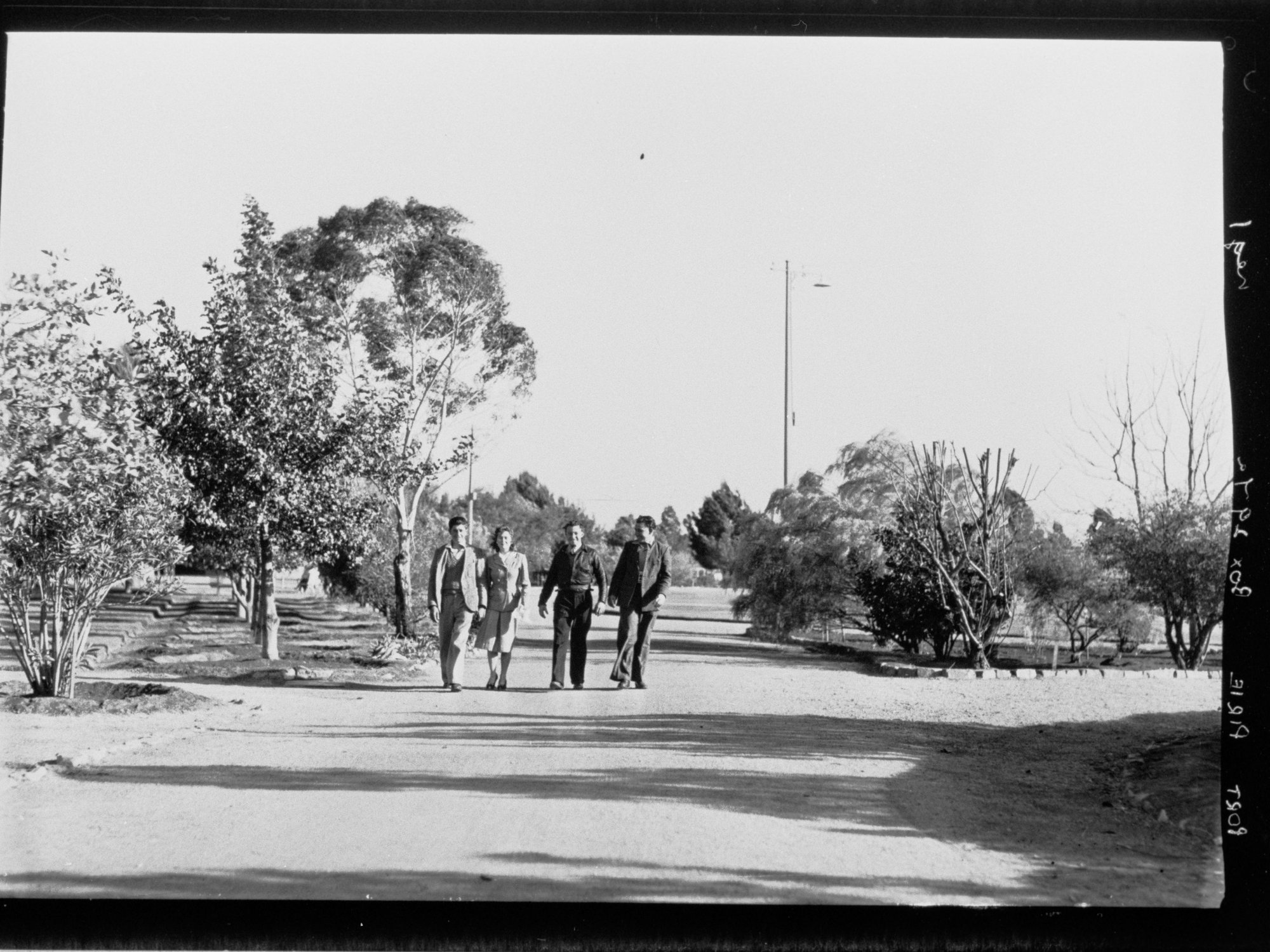 Port Pirie - four people walking in park