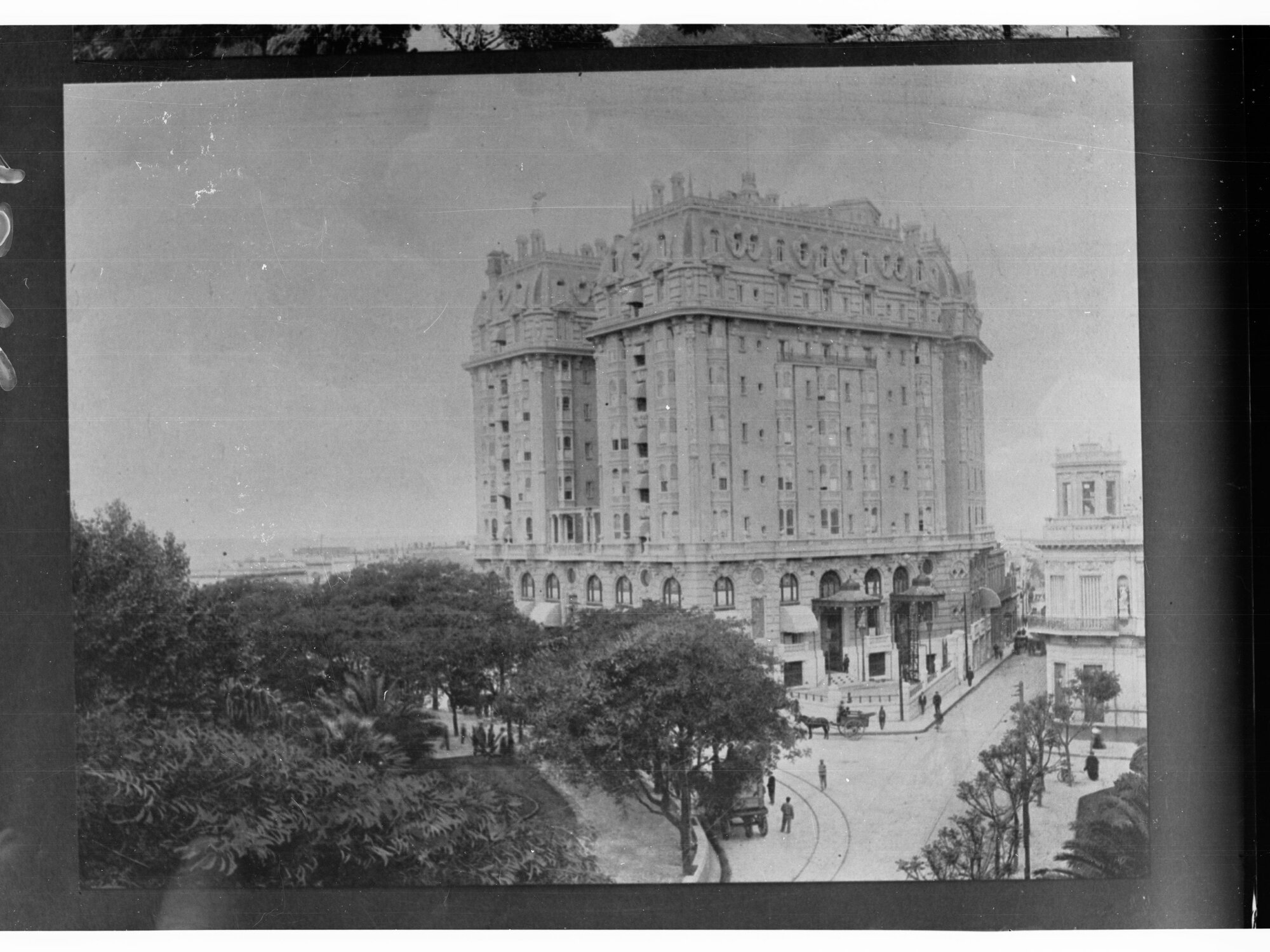 City Building in South America Showing Showing Street and People Walking Down it