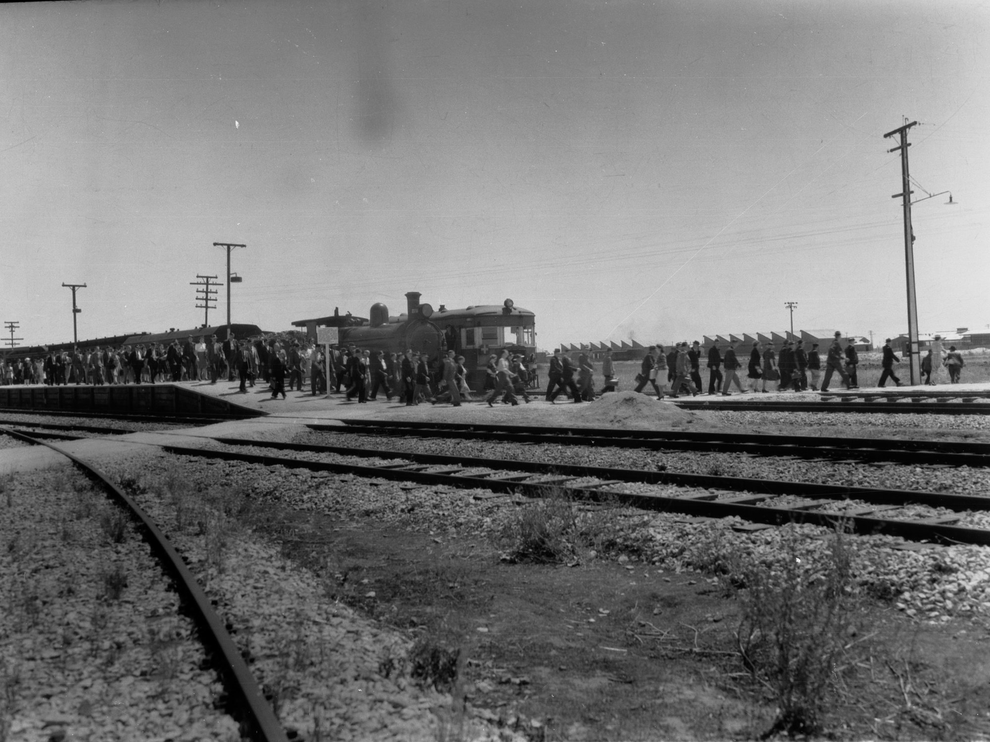 Men and Women arriving by train to work at the Salisbury Munitions Works