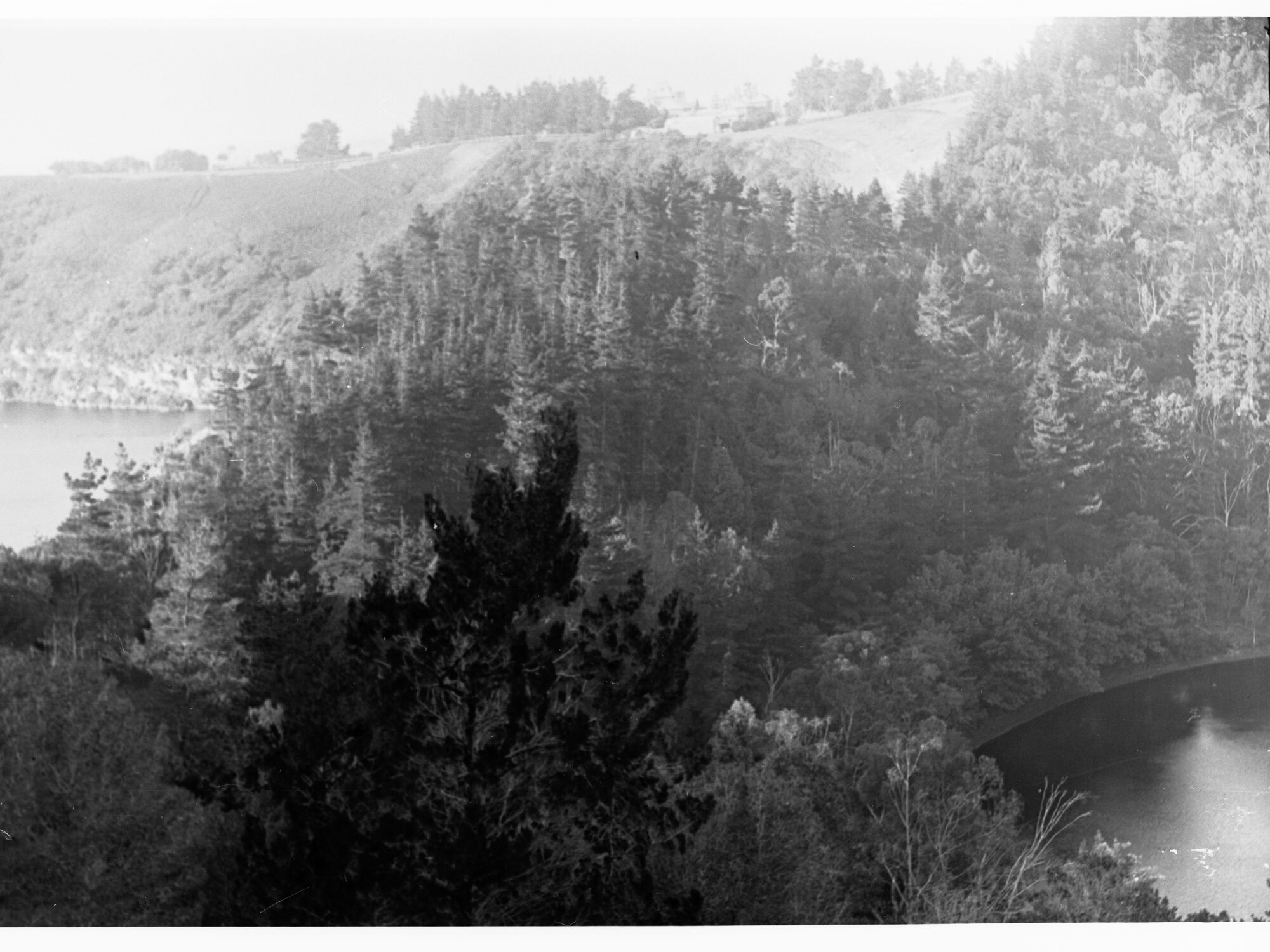 Leg of Mutton Lake just visible on the right amongst pine trees